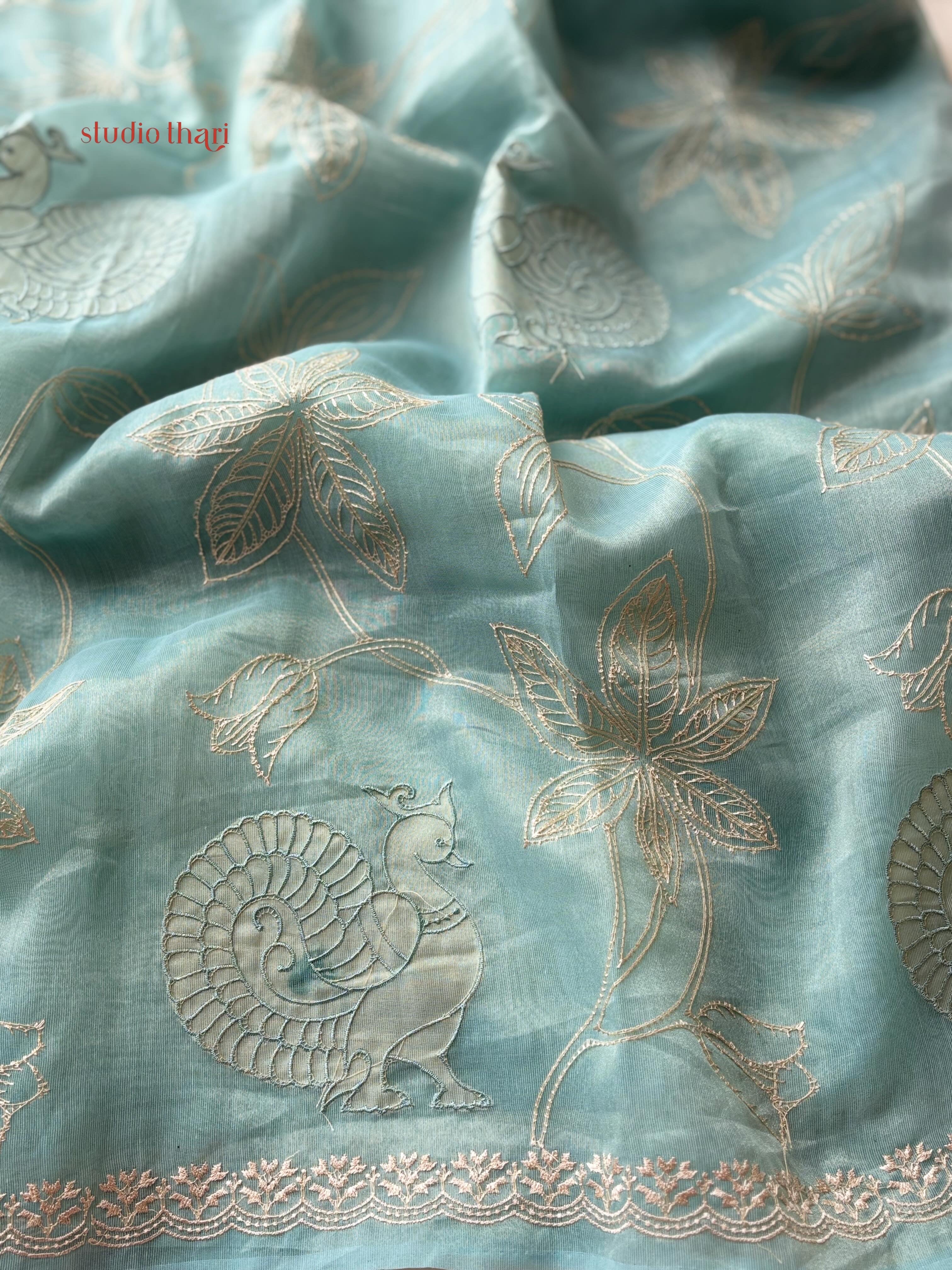 Neel mayuri semi organza saree