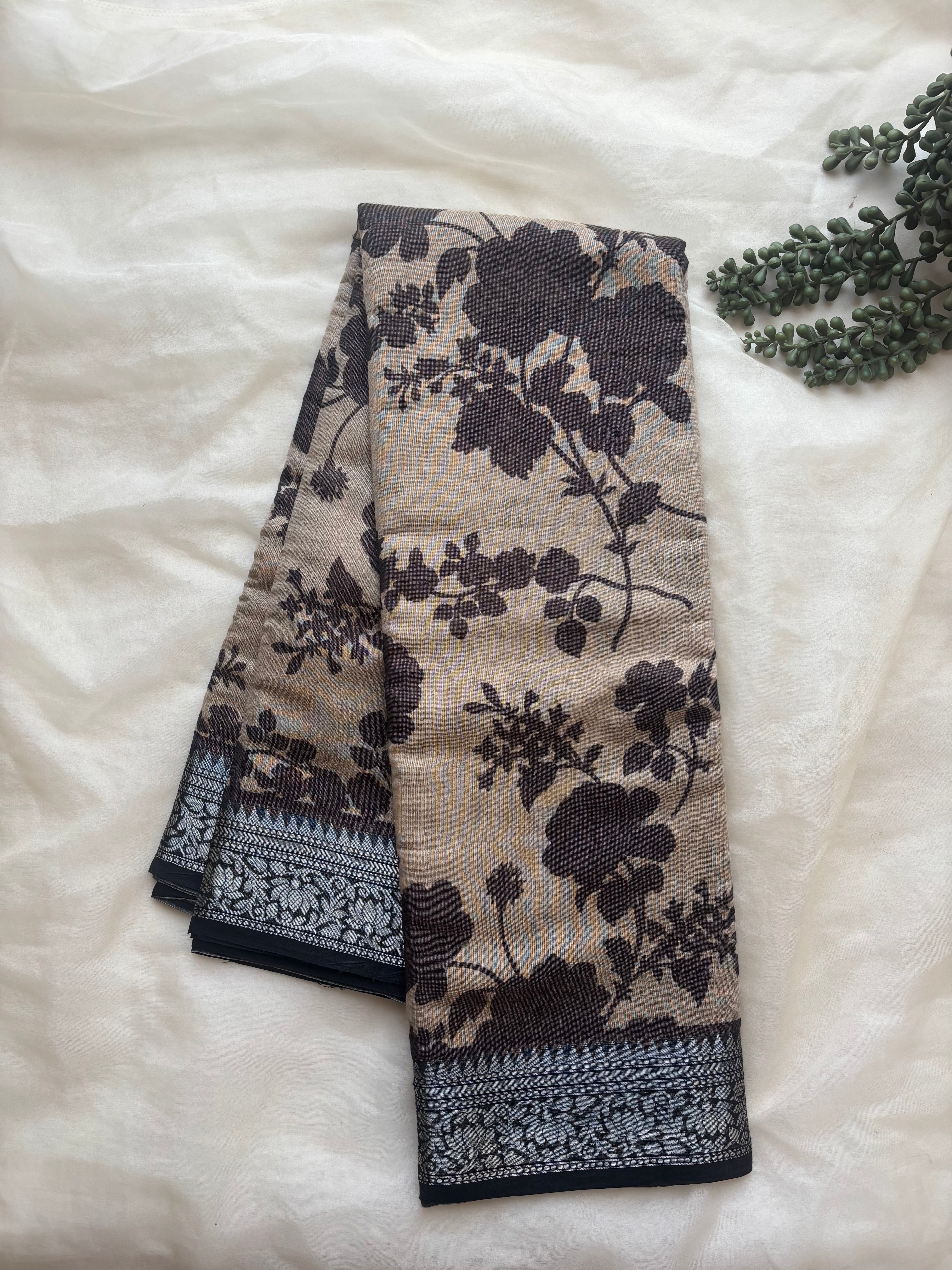 Beige and black semi tissue saree