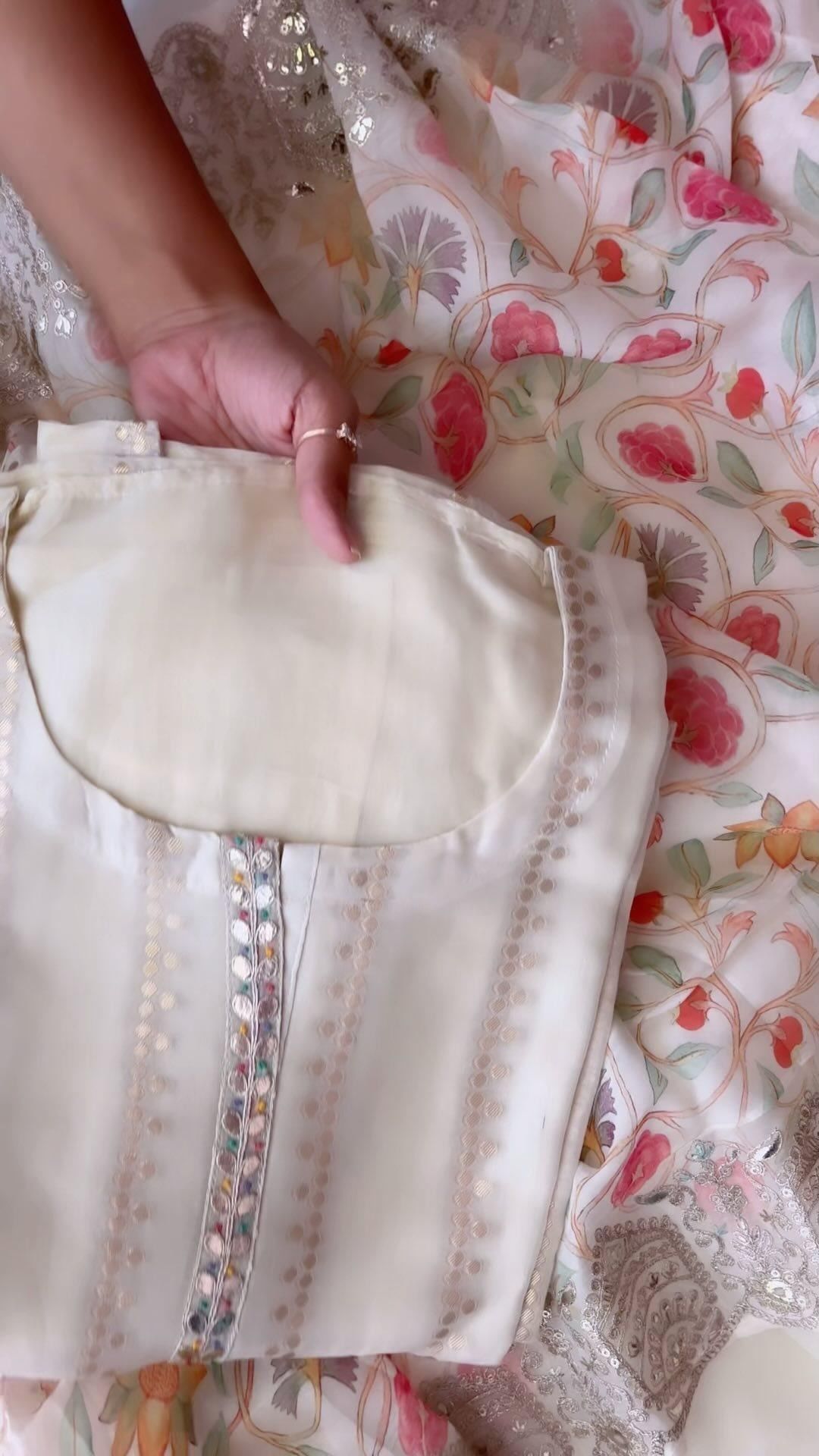 organza semi stitched suit with zari scalloped detailing in neck Bottom fabric