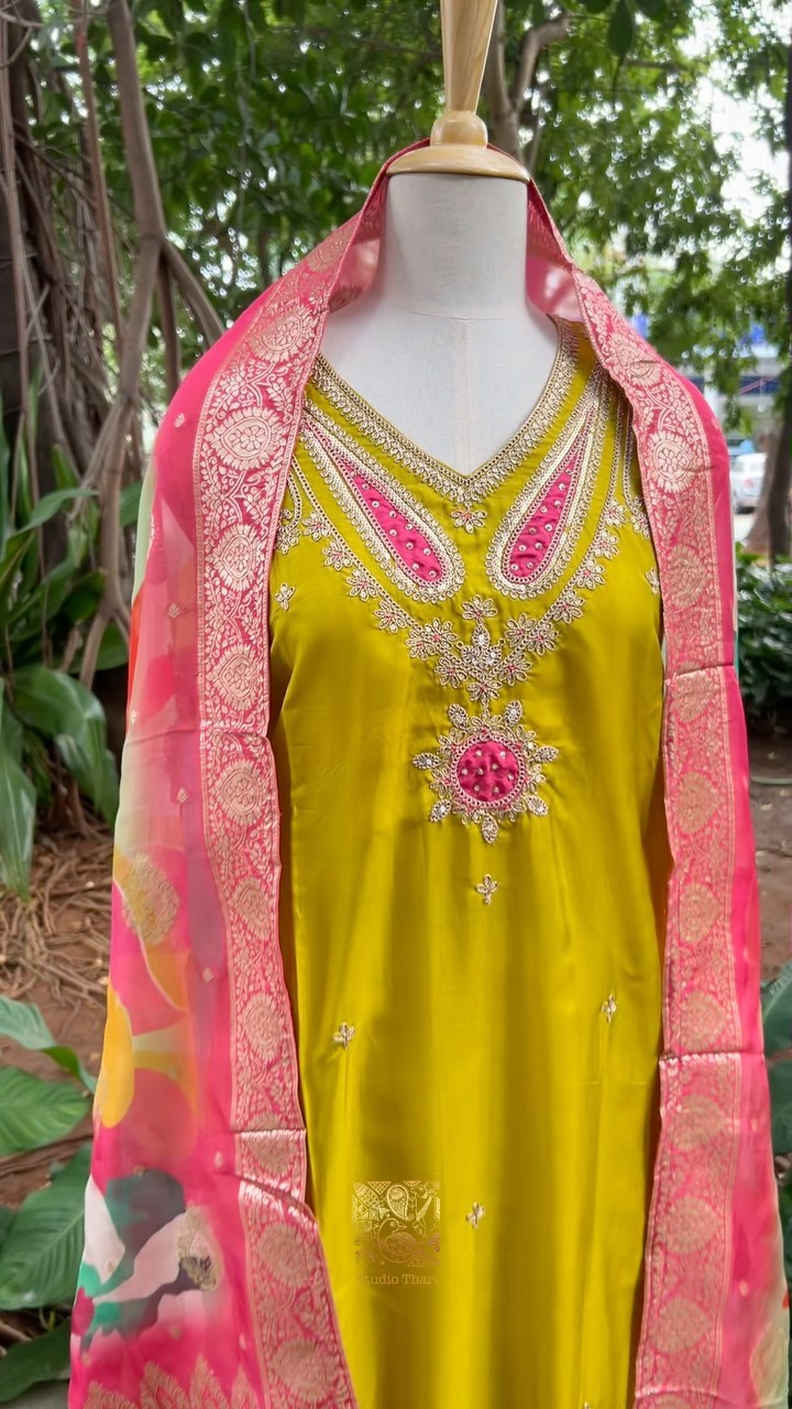 Muslin semi stitched top with detailed embroidered neckline