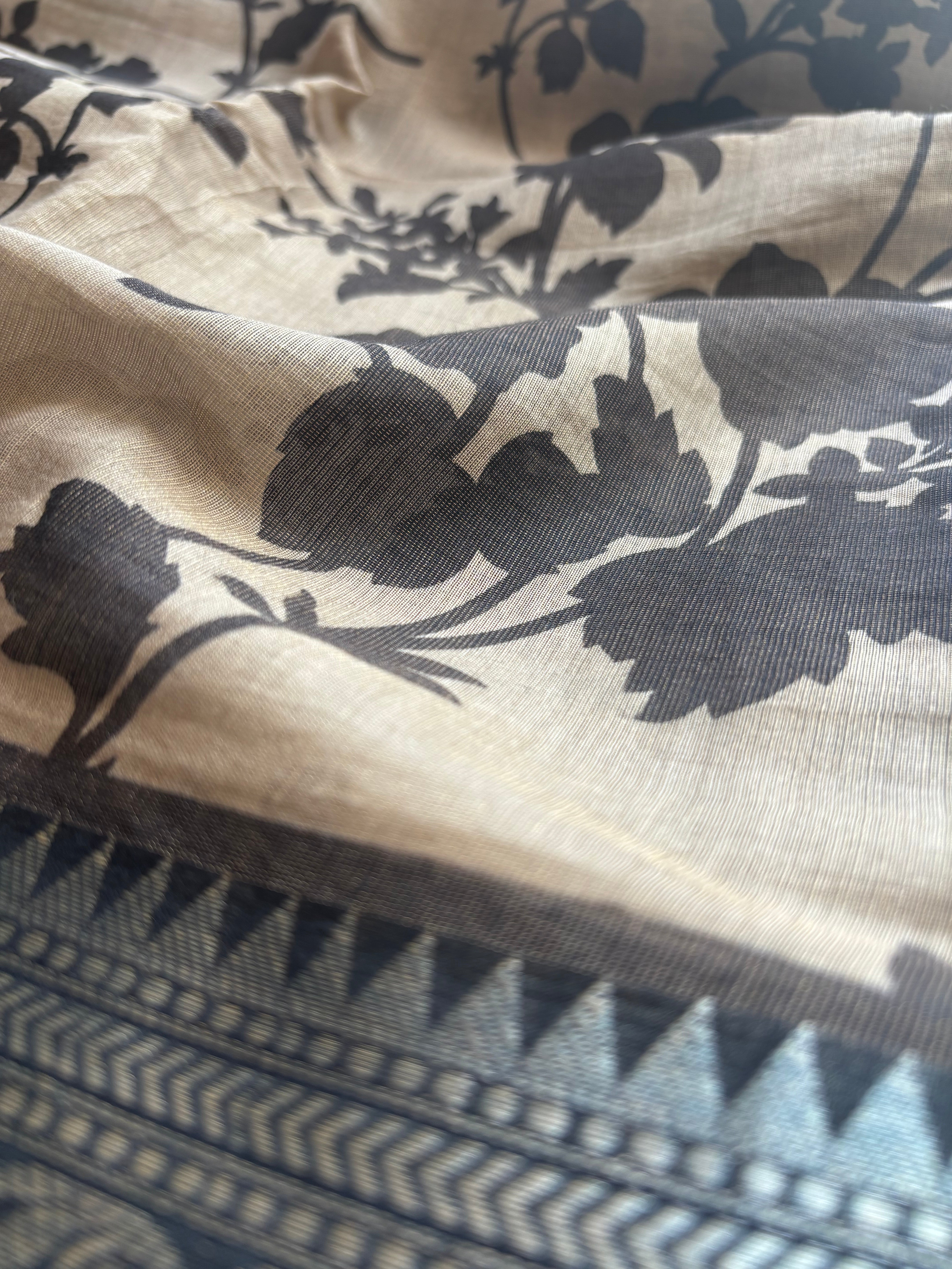 Beige and black semi tissue saree