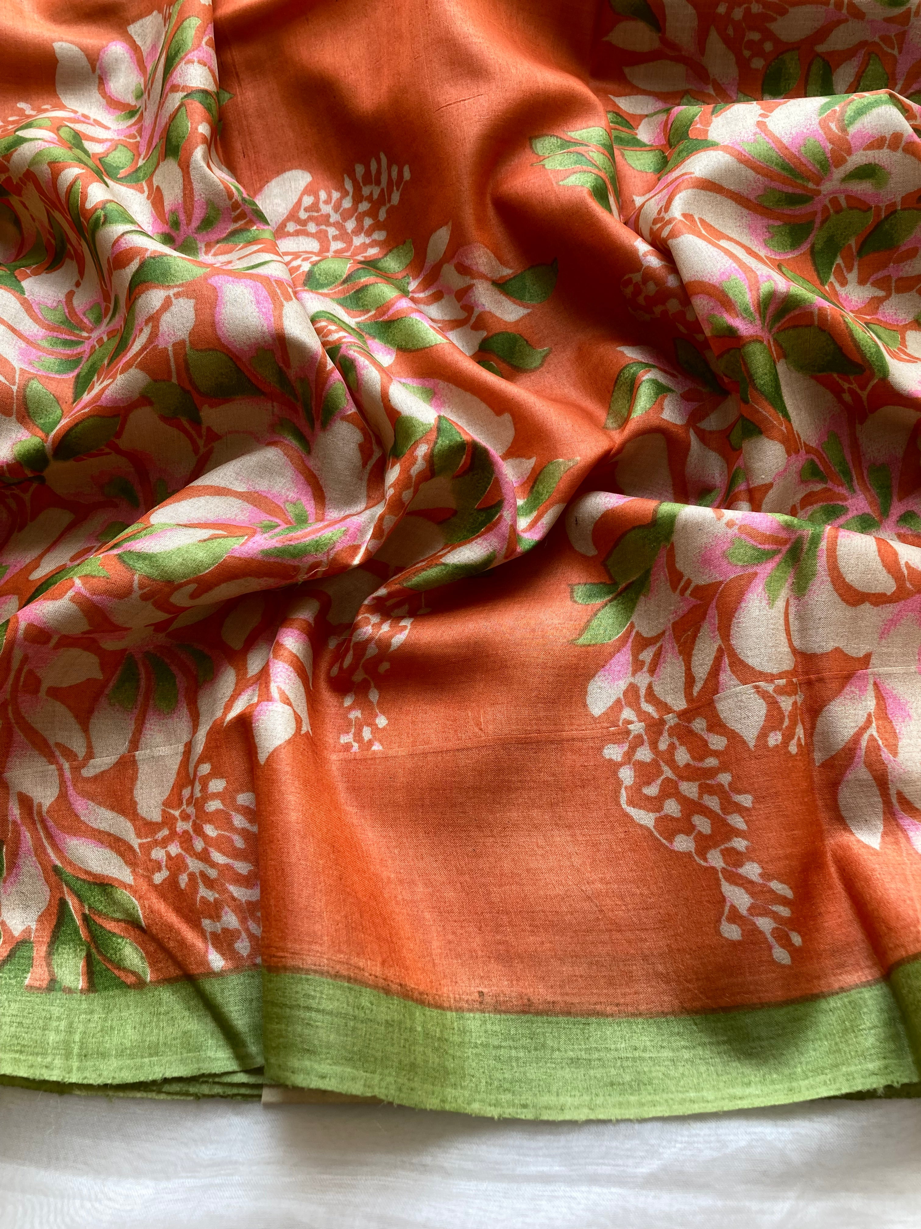 Orange & green floral Tussar saree