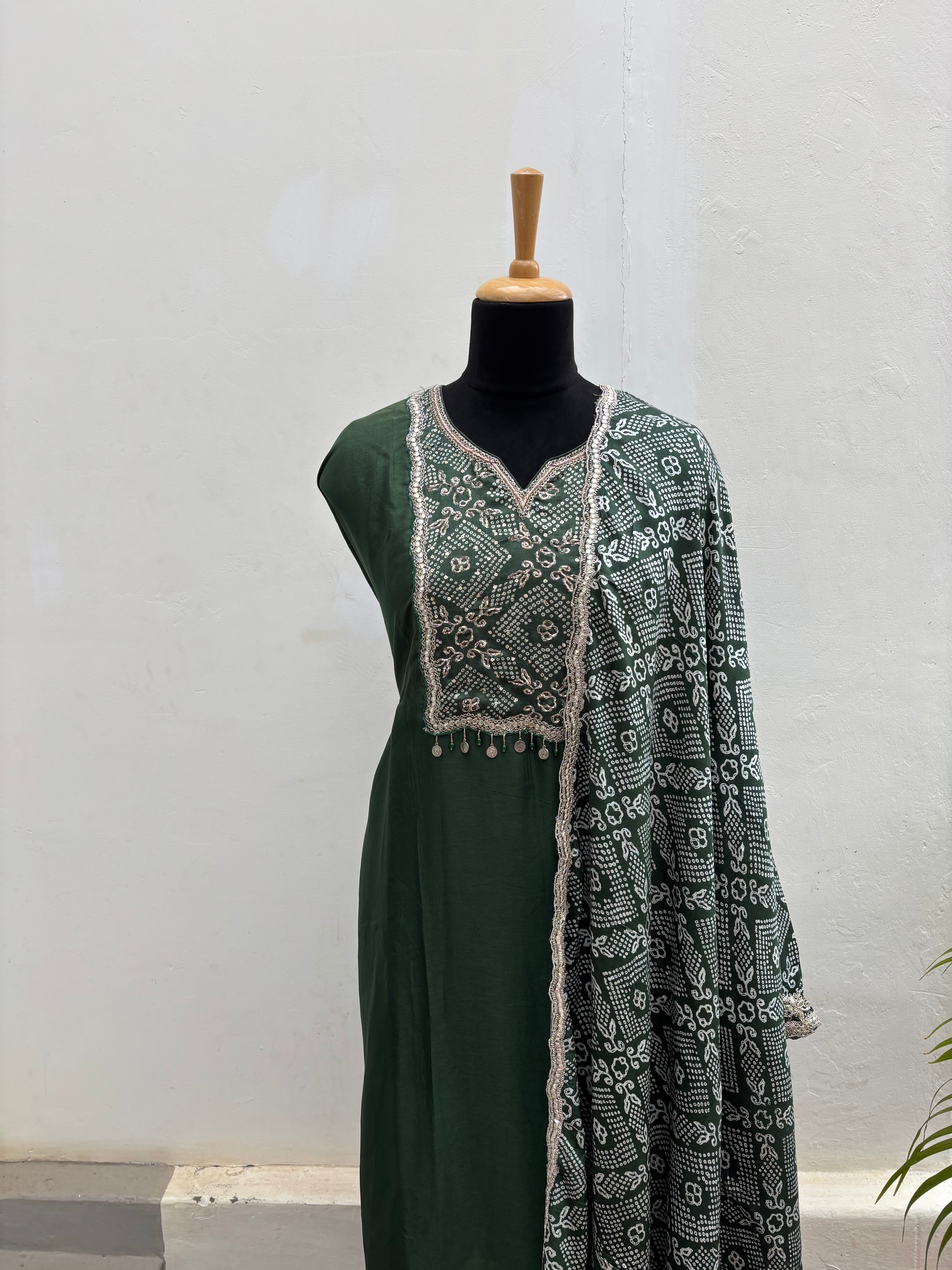 Emerald green semi stitched salwar suit