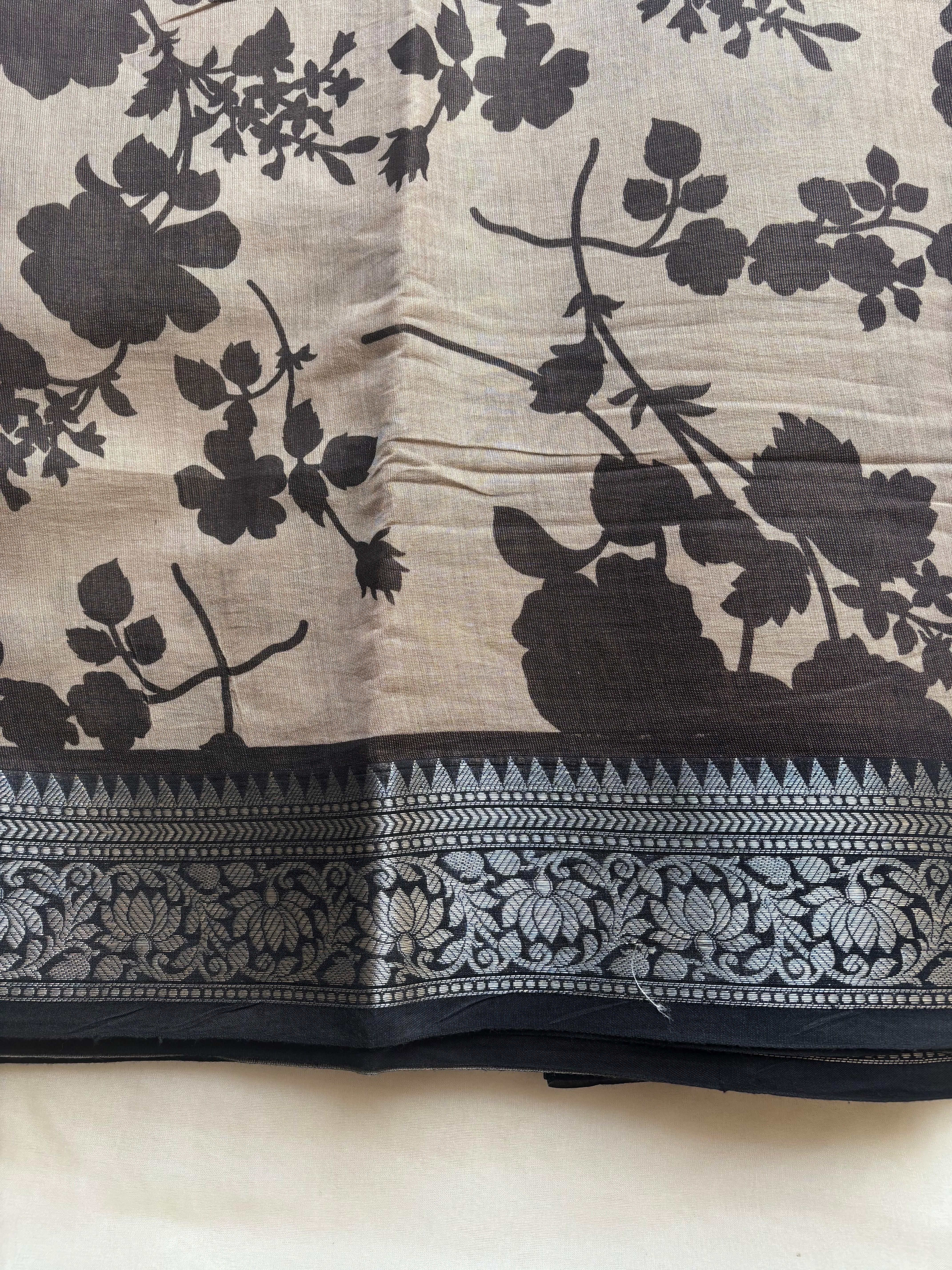 Beige and black semi tissue saree