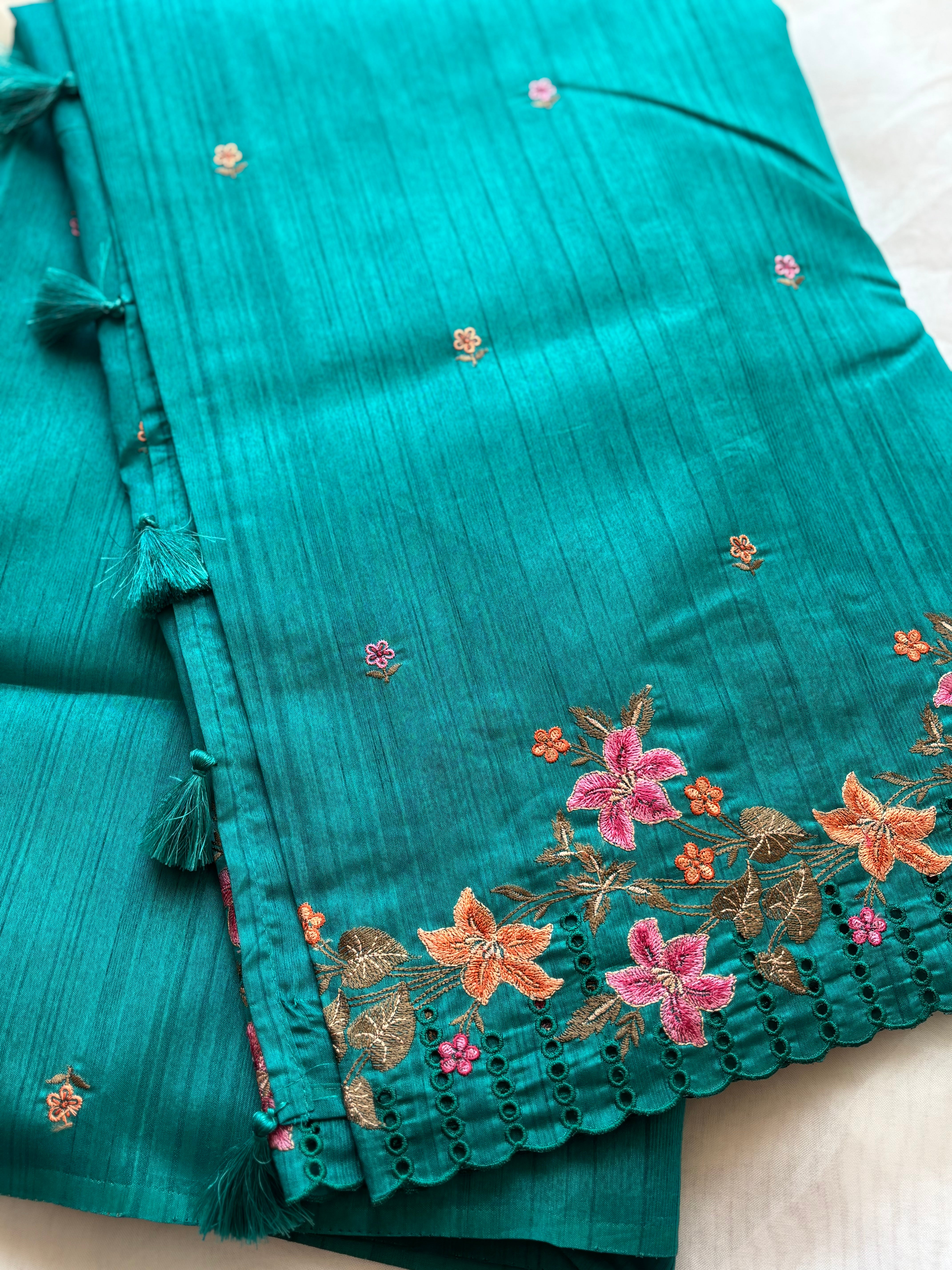 Teal blue floral semi tussar saree