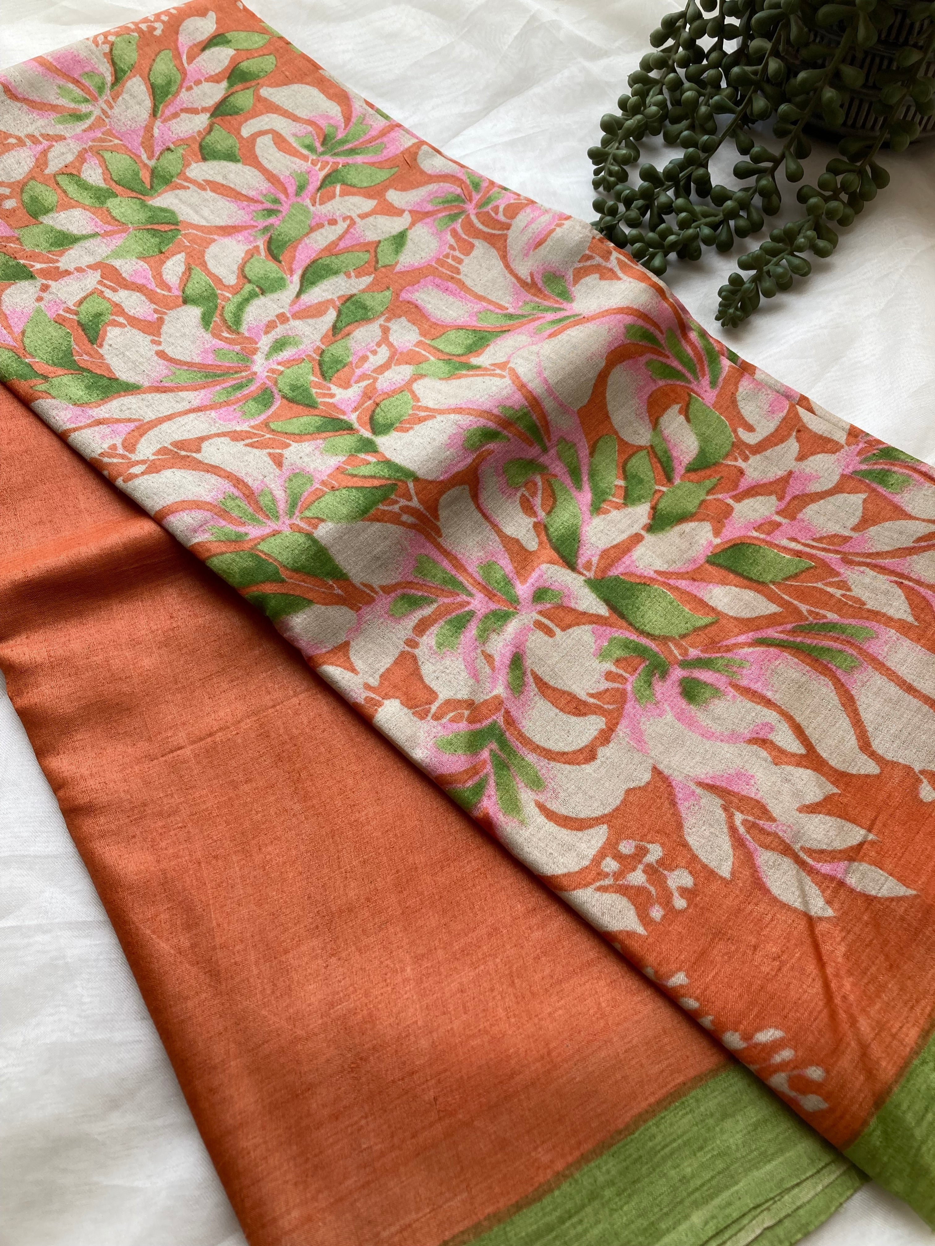 Orange & green floral Tussar saree