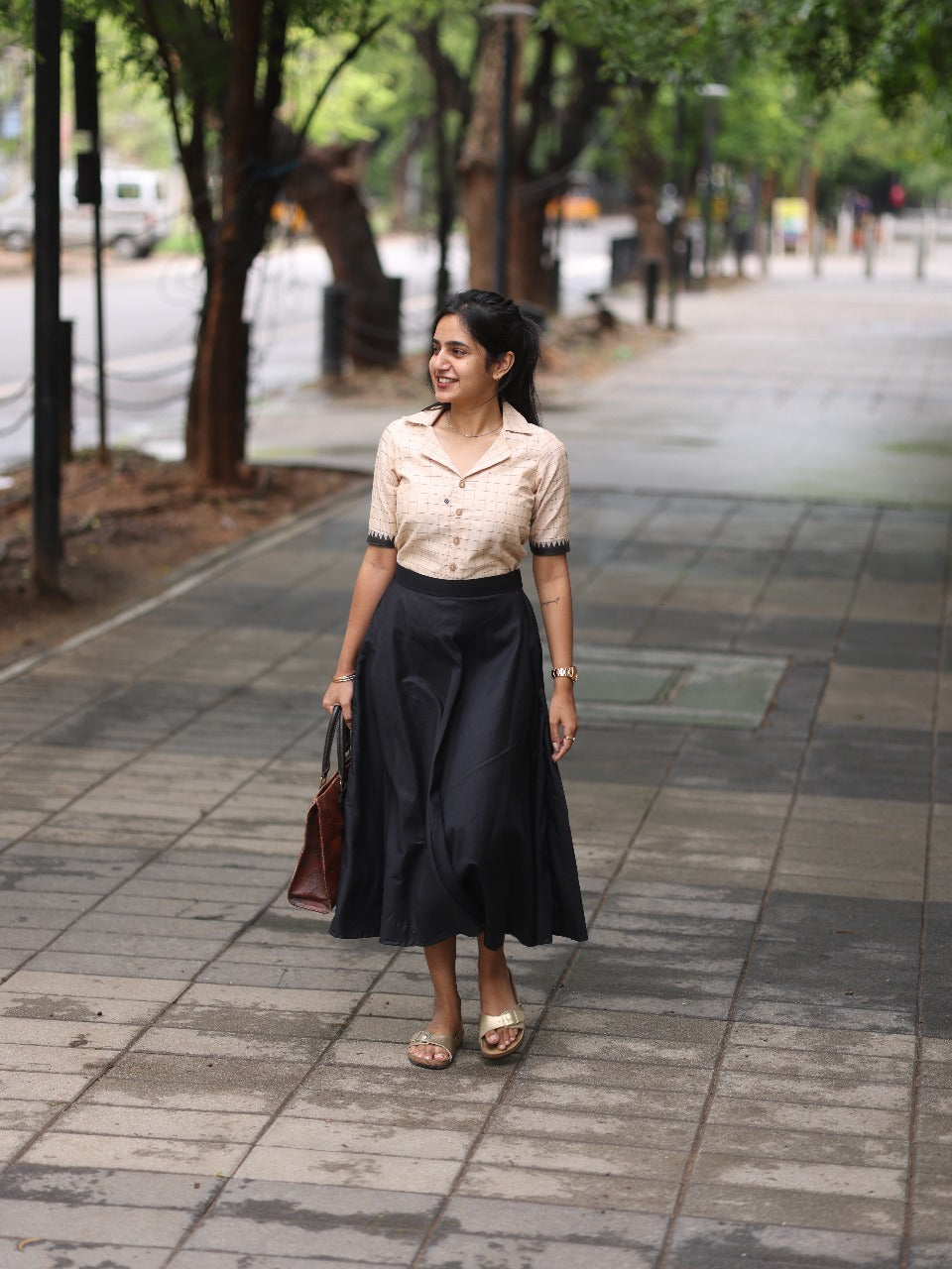 Chic Beige Checked Top with black skirt