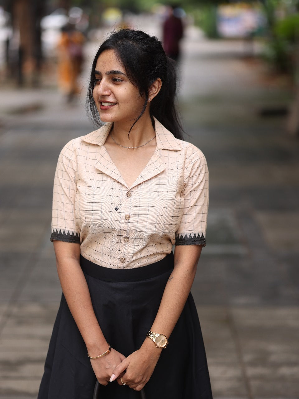 Chic Beige Checked Top with black skirt
