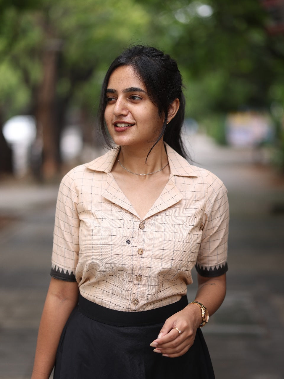 Chic Beige Checked Top with black skirt
