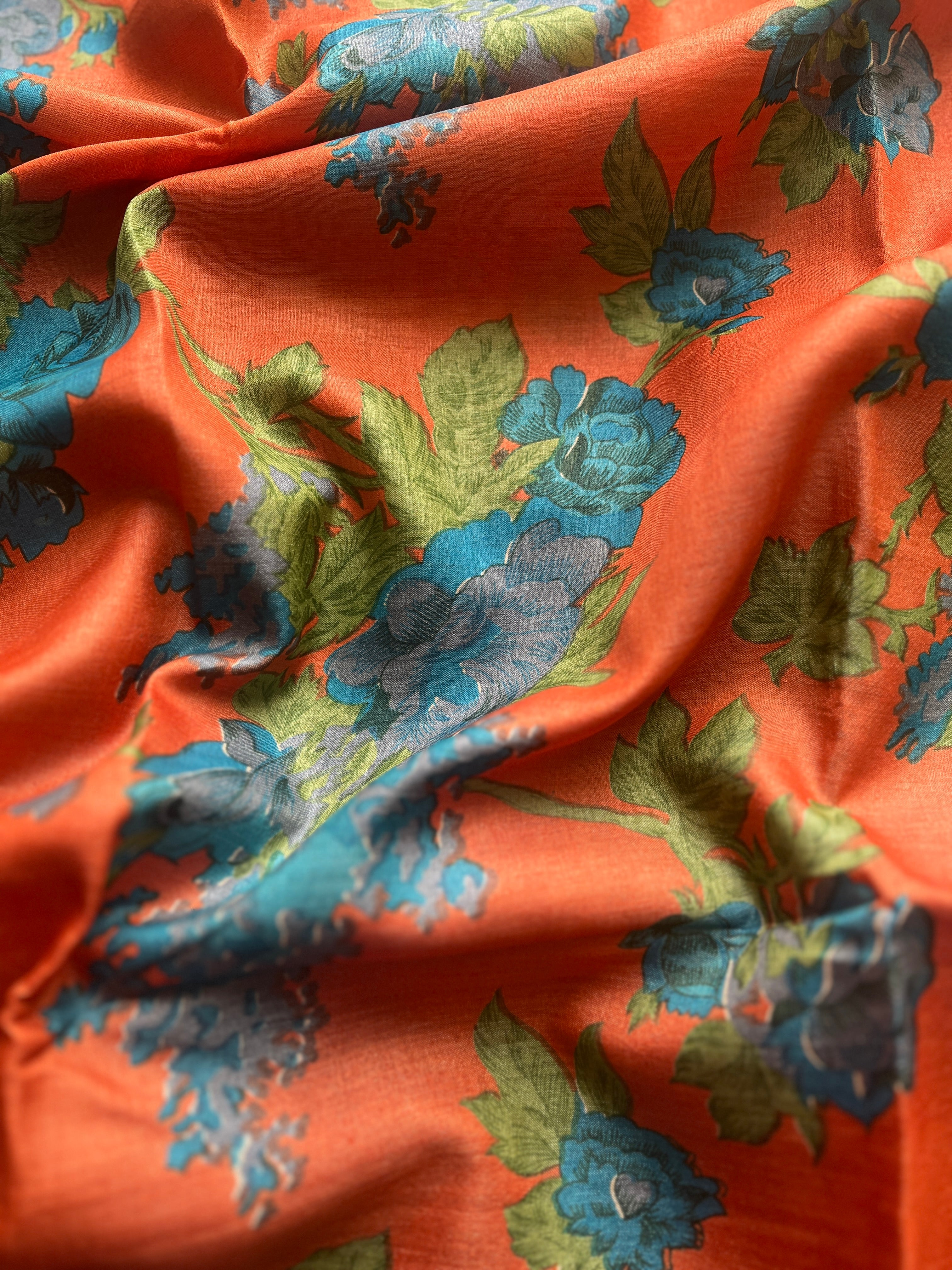Orange blue floral tussar saree