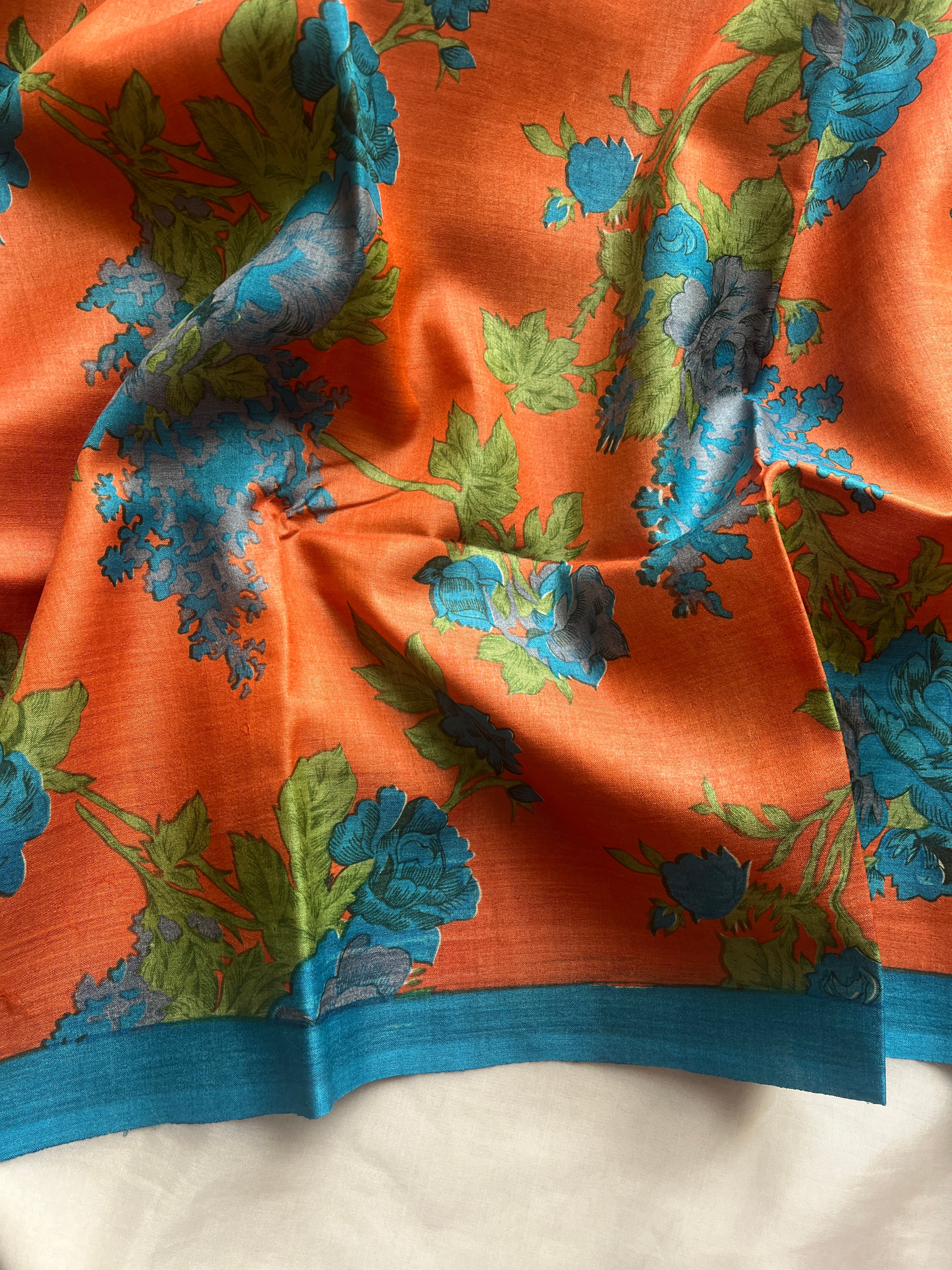 Orange blue floral tussar saree