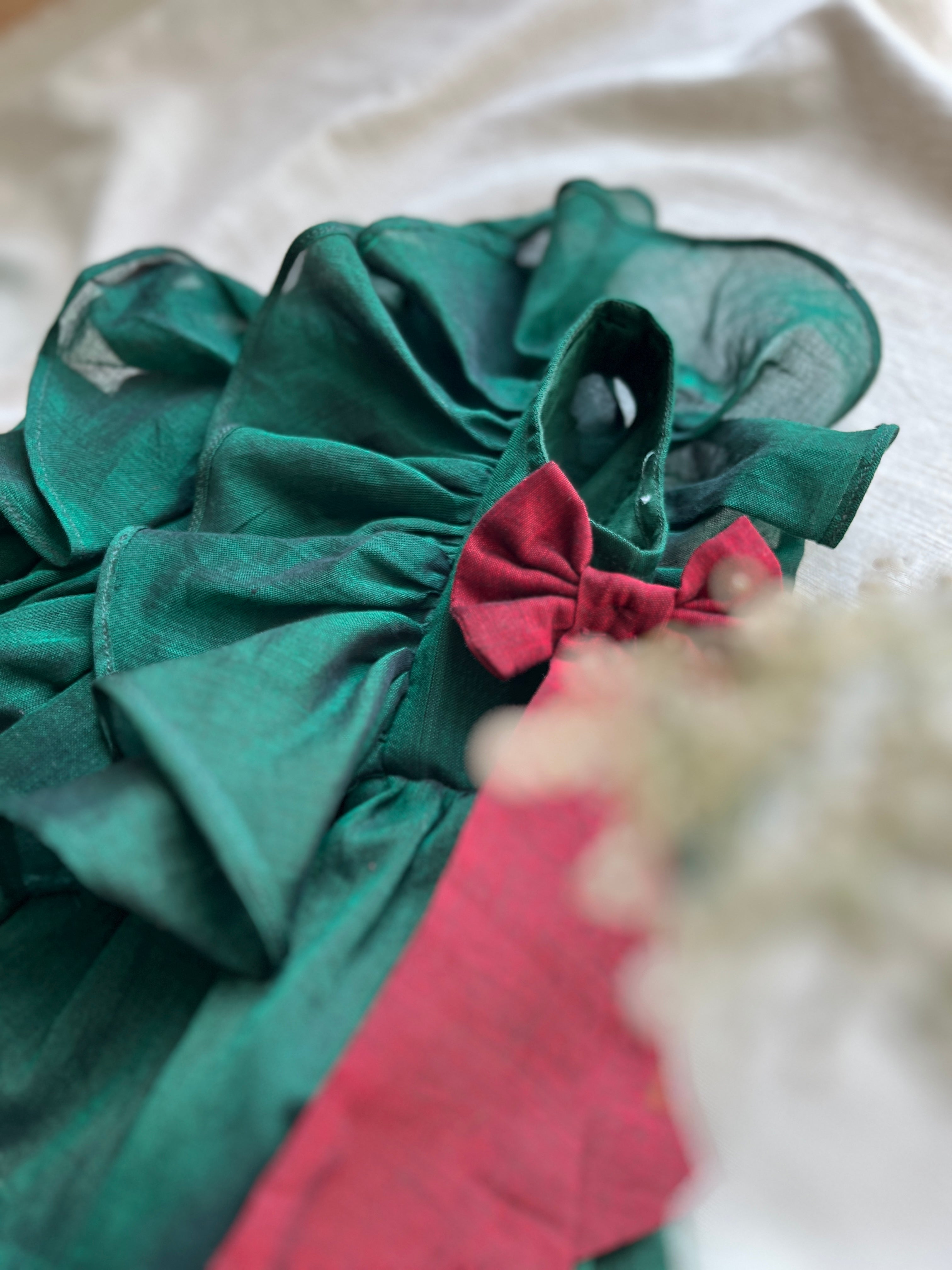 Emerald & red bow ruffle dress