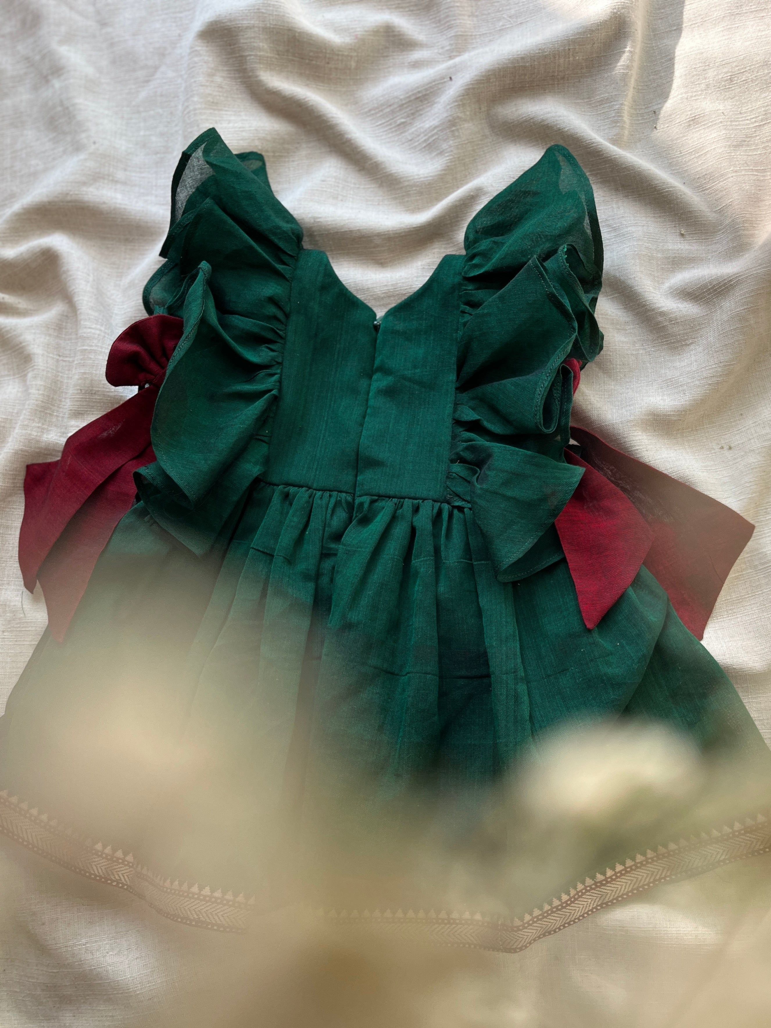 Emerald & red bow ruffle dress