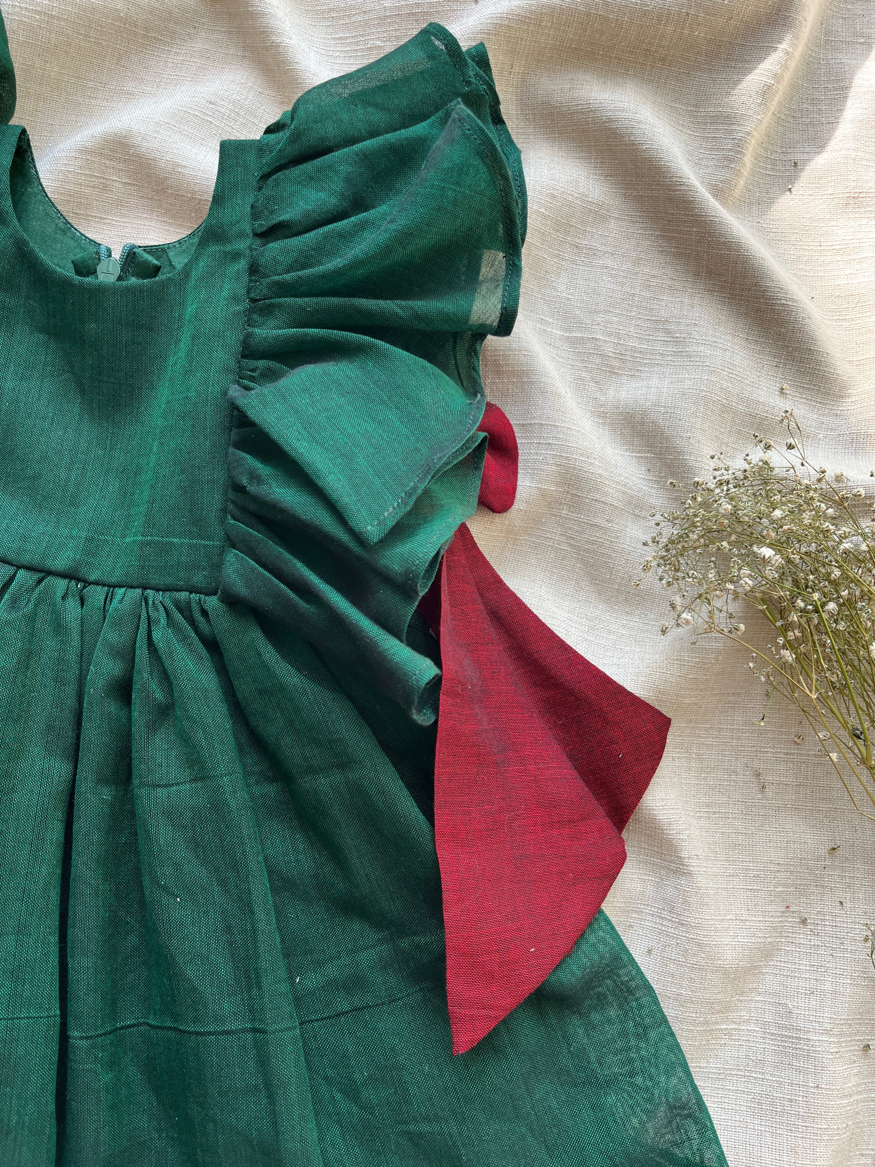 Emerald & red bow ruffle dress