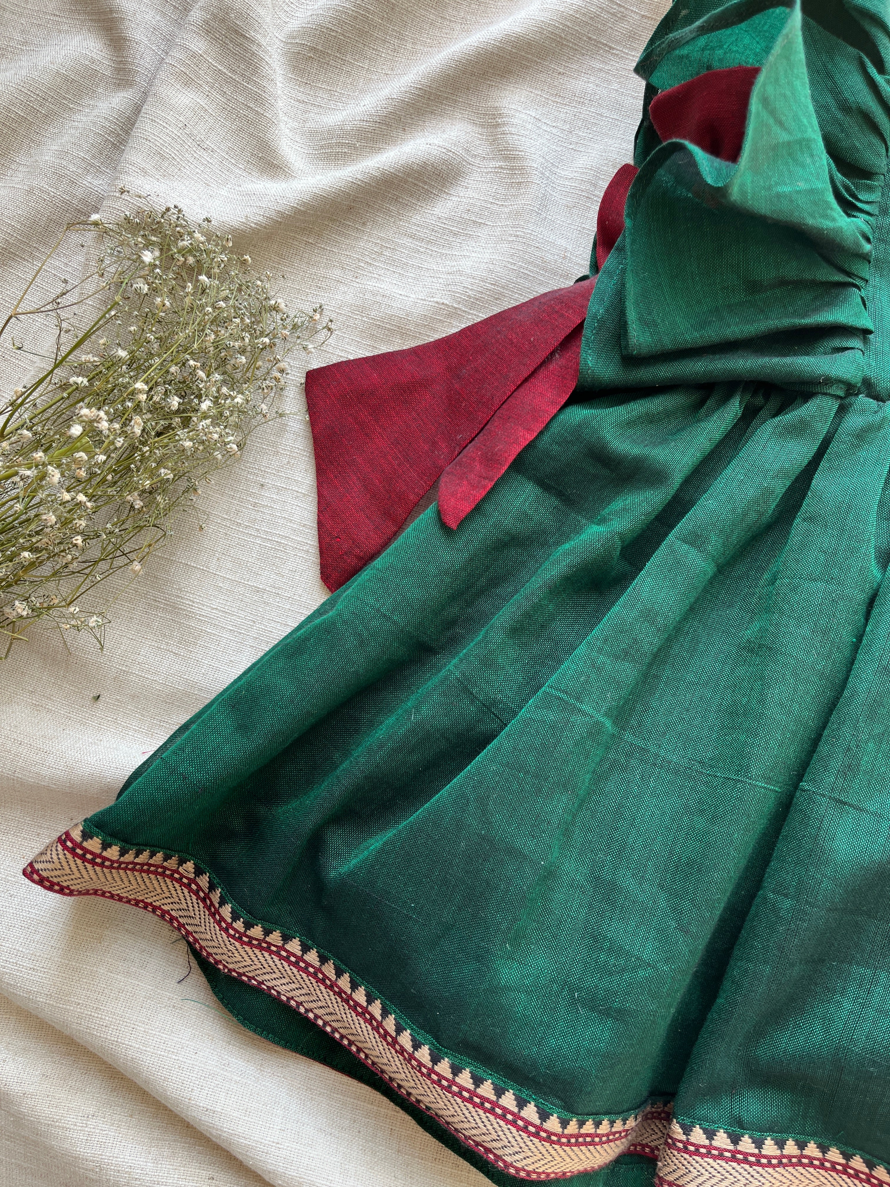 Emerald & red bow ruffle dress