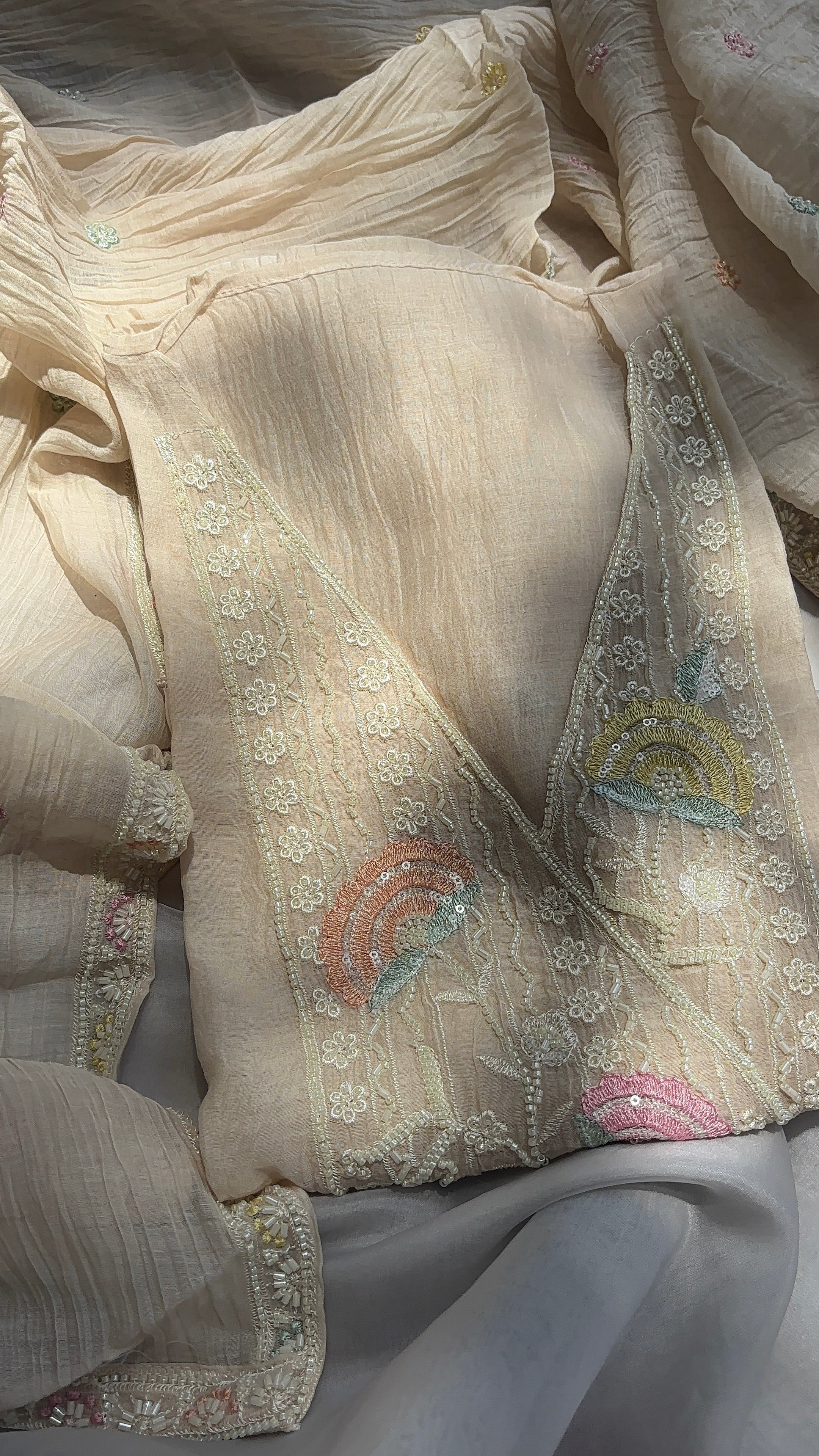 Cream White Crushed pure mul chanderi unstitched suits, Paired with hand-embroidered dupatta, and soft shantoon pants.