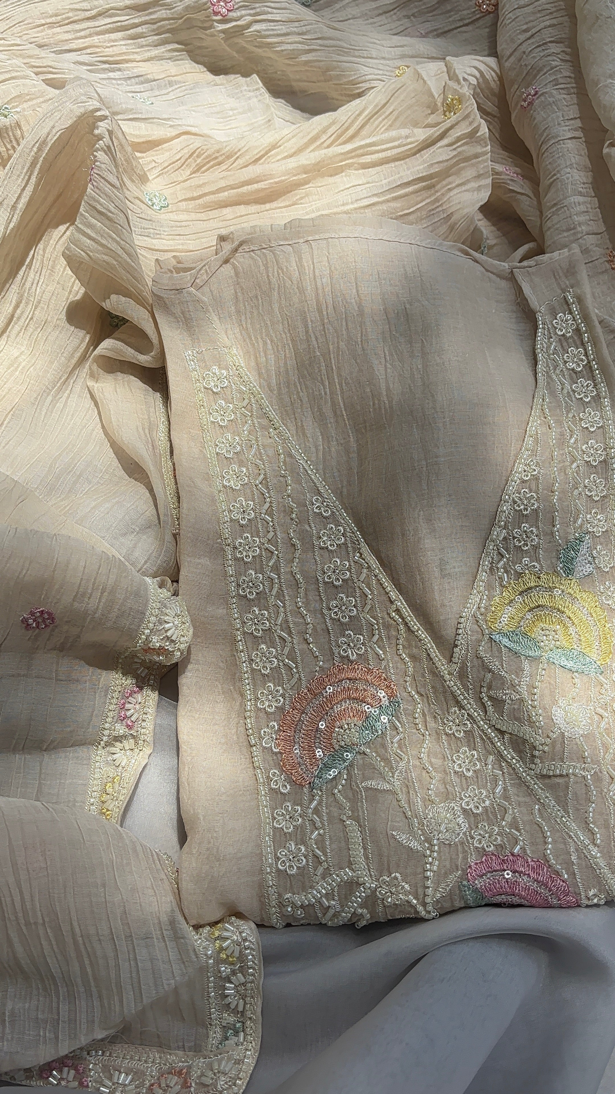 Cream White Crushed pure mul chanderi unstitched suits, Paired with hand-embroidered dupatta, and soft shantoon pants.