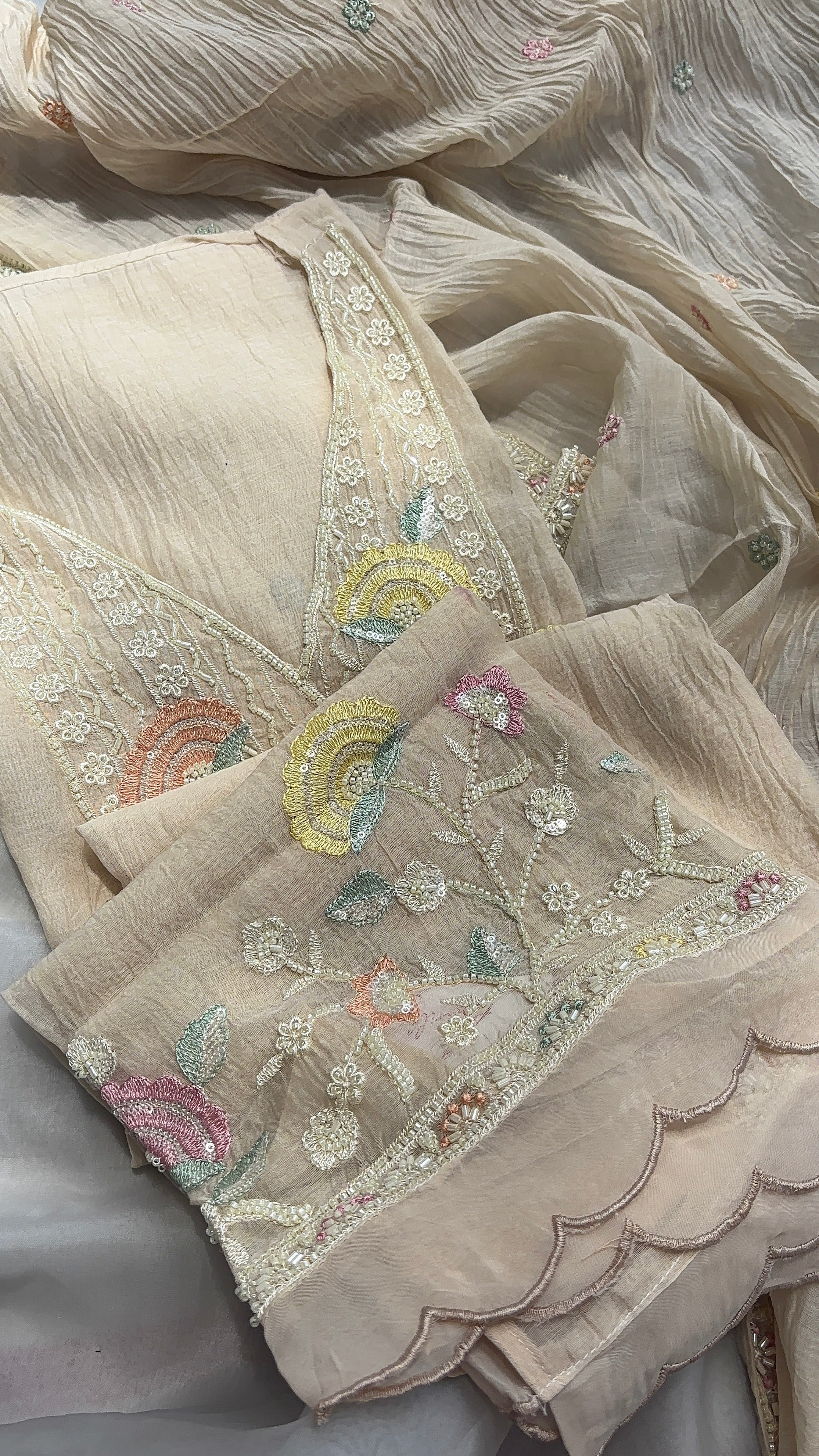 Cream White Crushed pure mul chanderi unstitched suits, Paired with hand-embroidered dupatta, and soft shantoon pants.