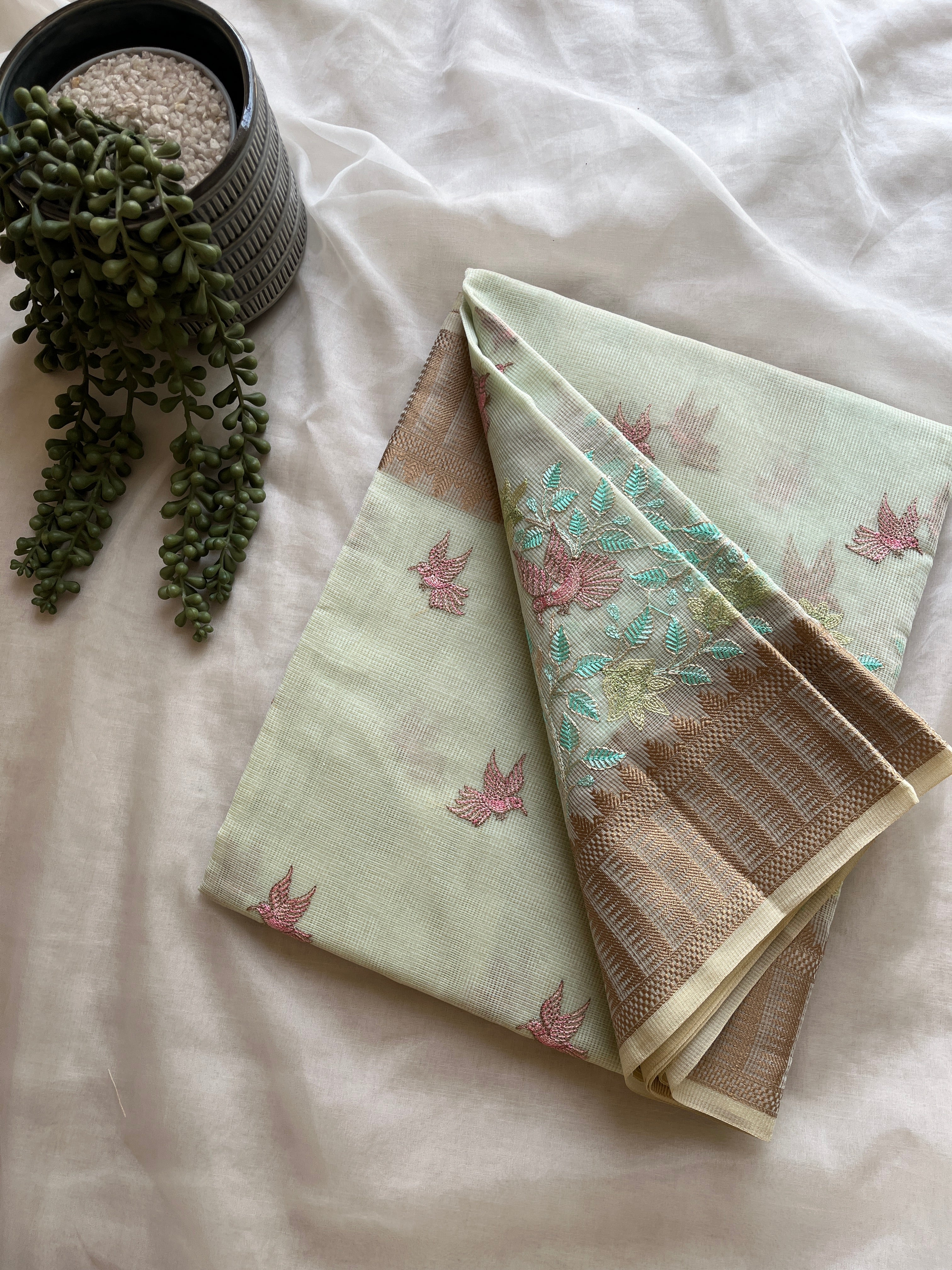 Powder blue  linen blend embroidered saree