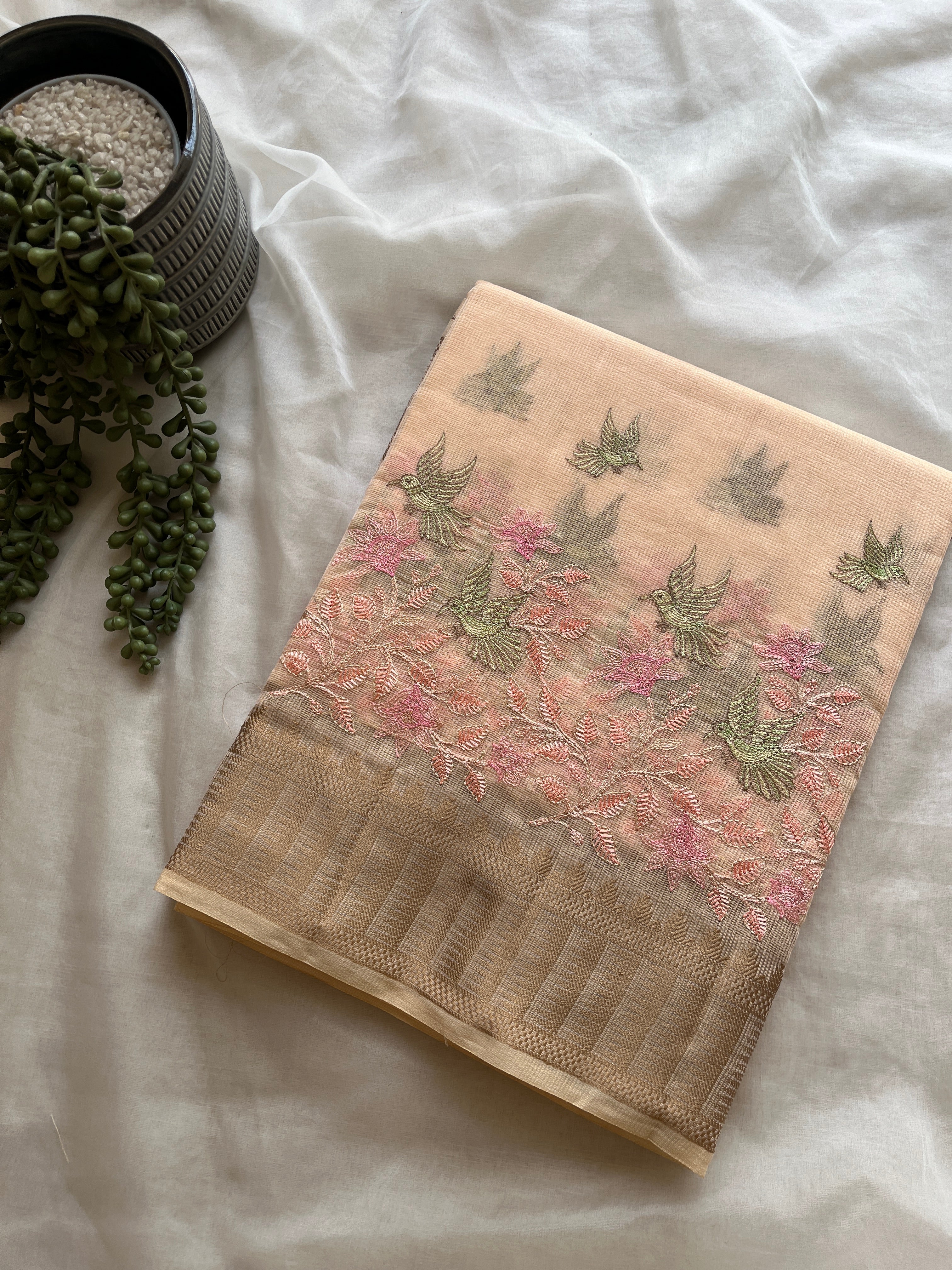 Peach linen blend embroidered saree