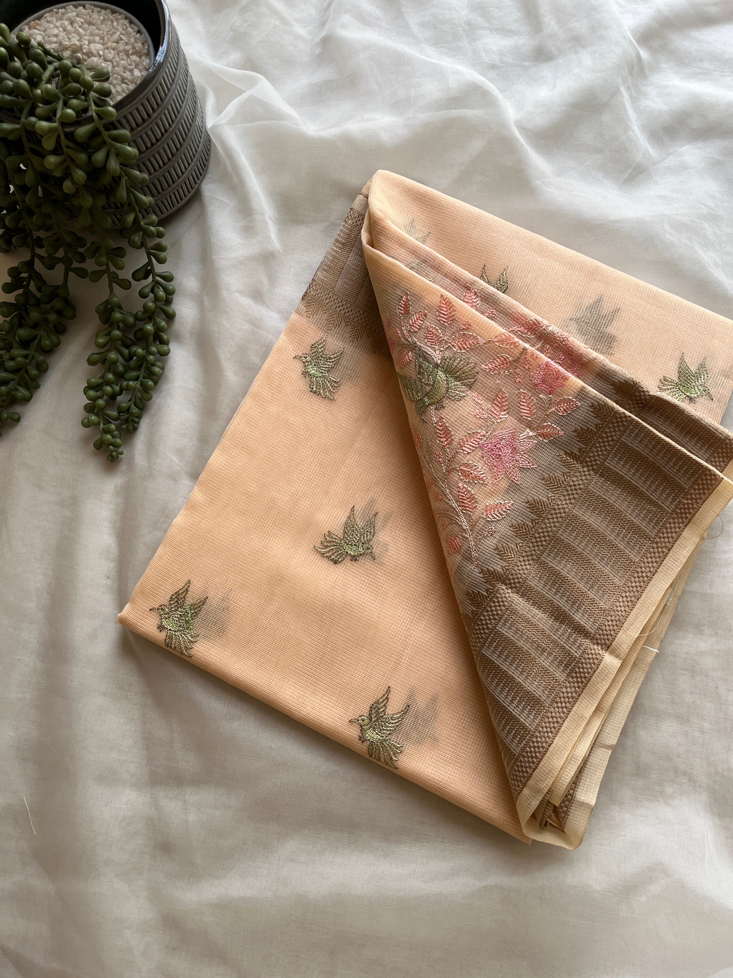 Peach linen blend embroidered saree