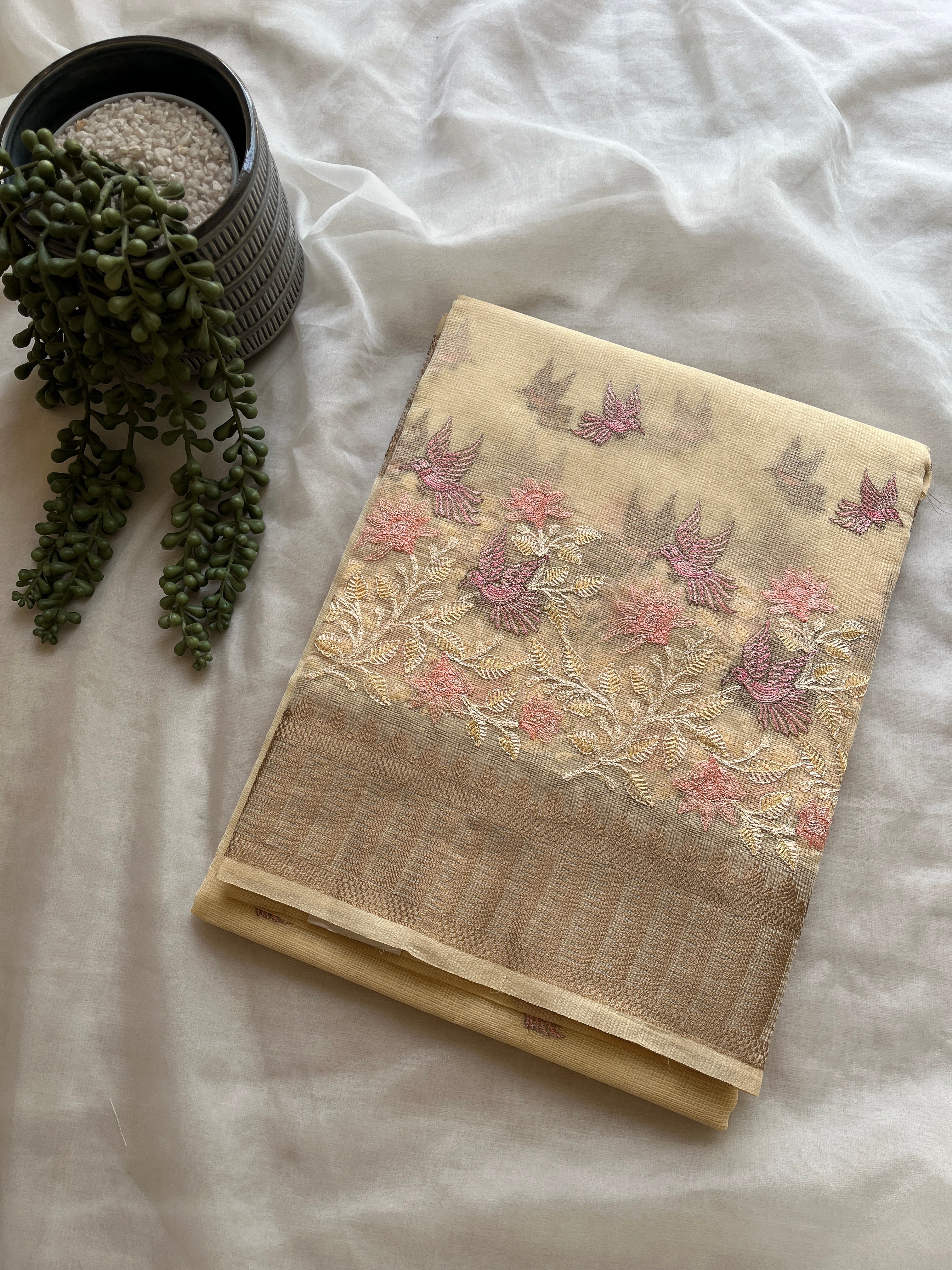 Butter yellow linen blend embroidered saree