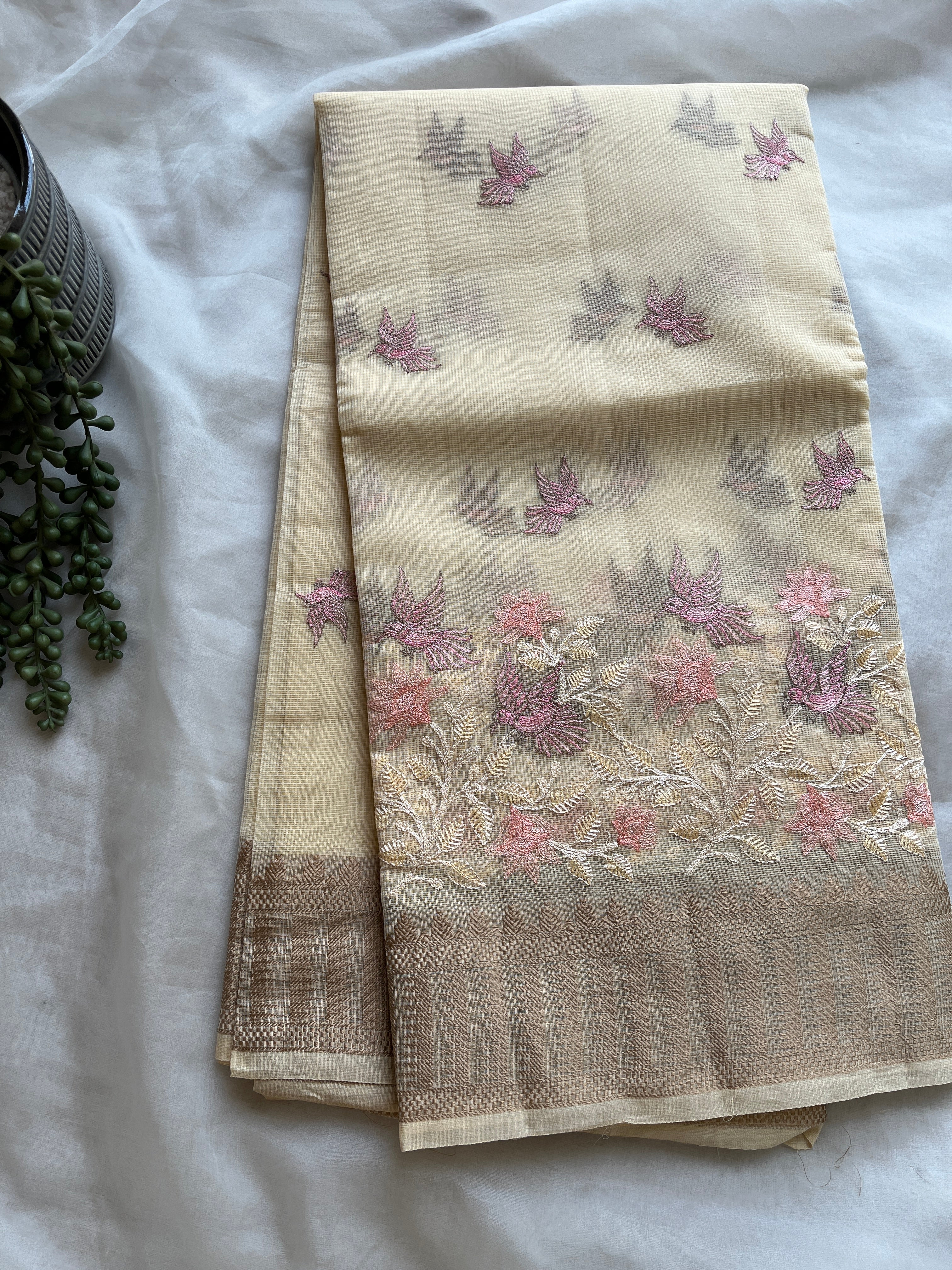 Butter yellow linen blend embroidered saree