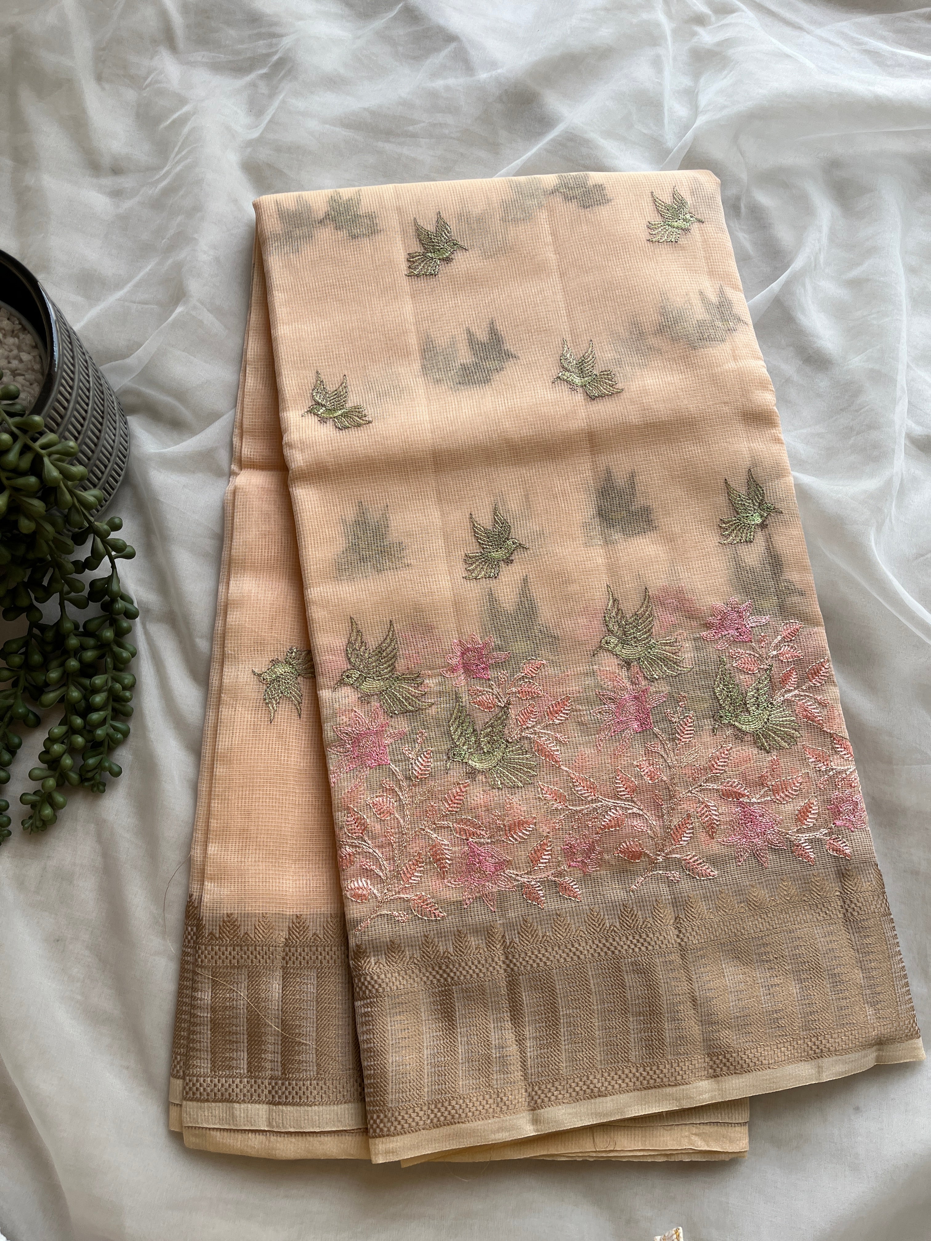 Peach linen blend embroidered saree