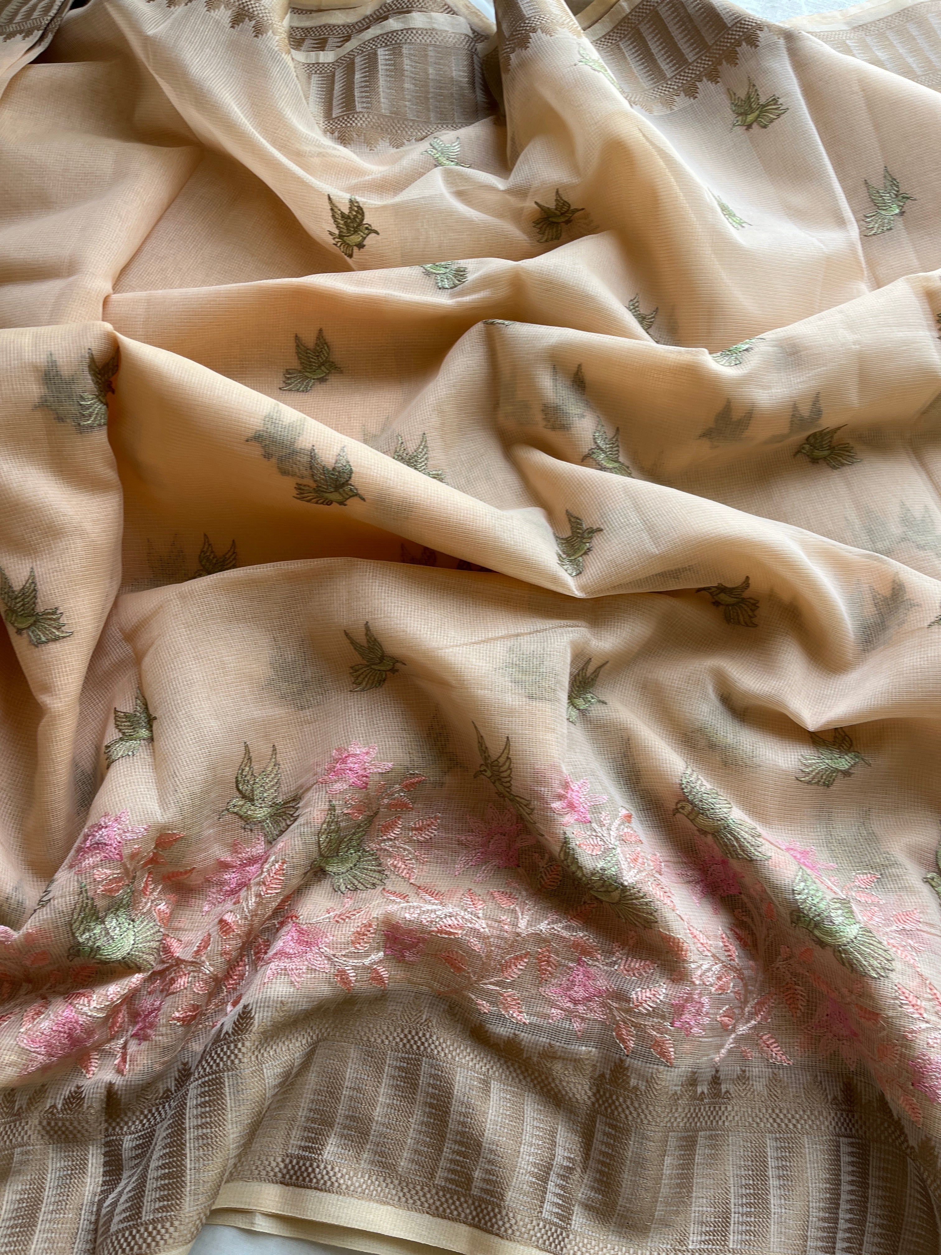 Peach linen blend embroidered saree