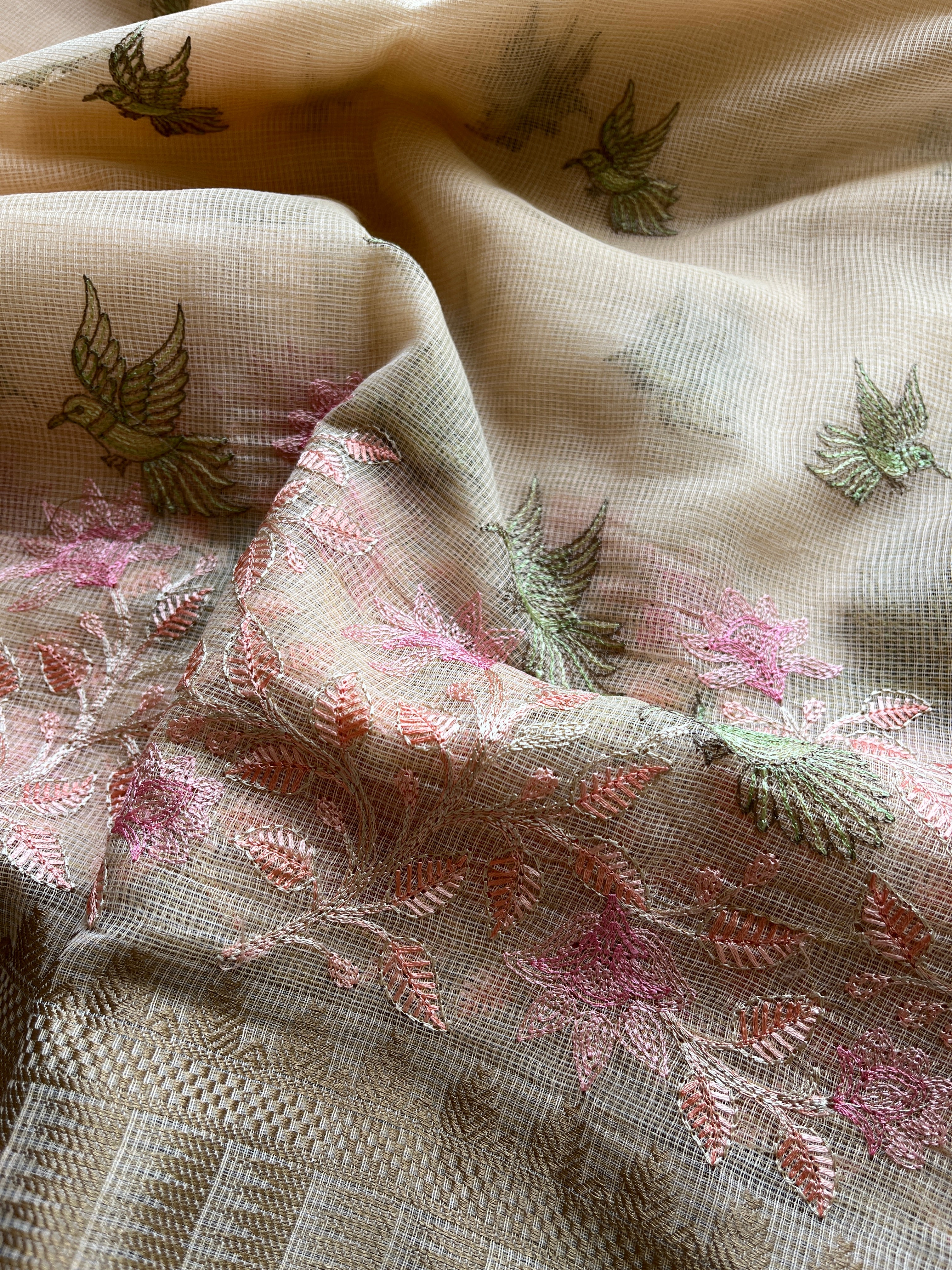 Peach linen blend embroidered saree