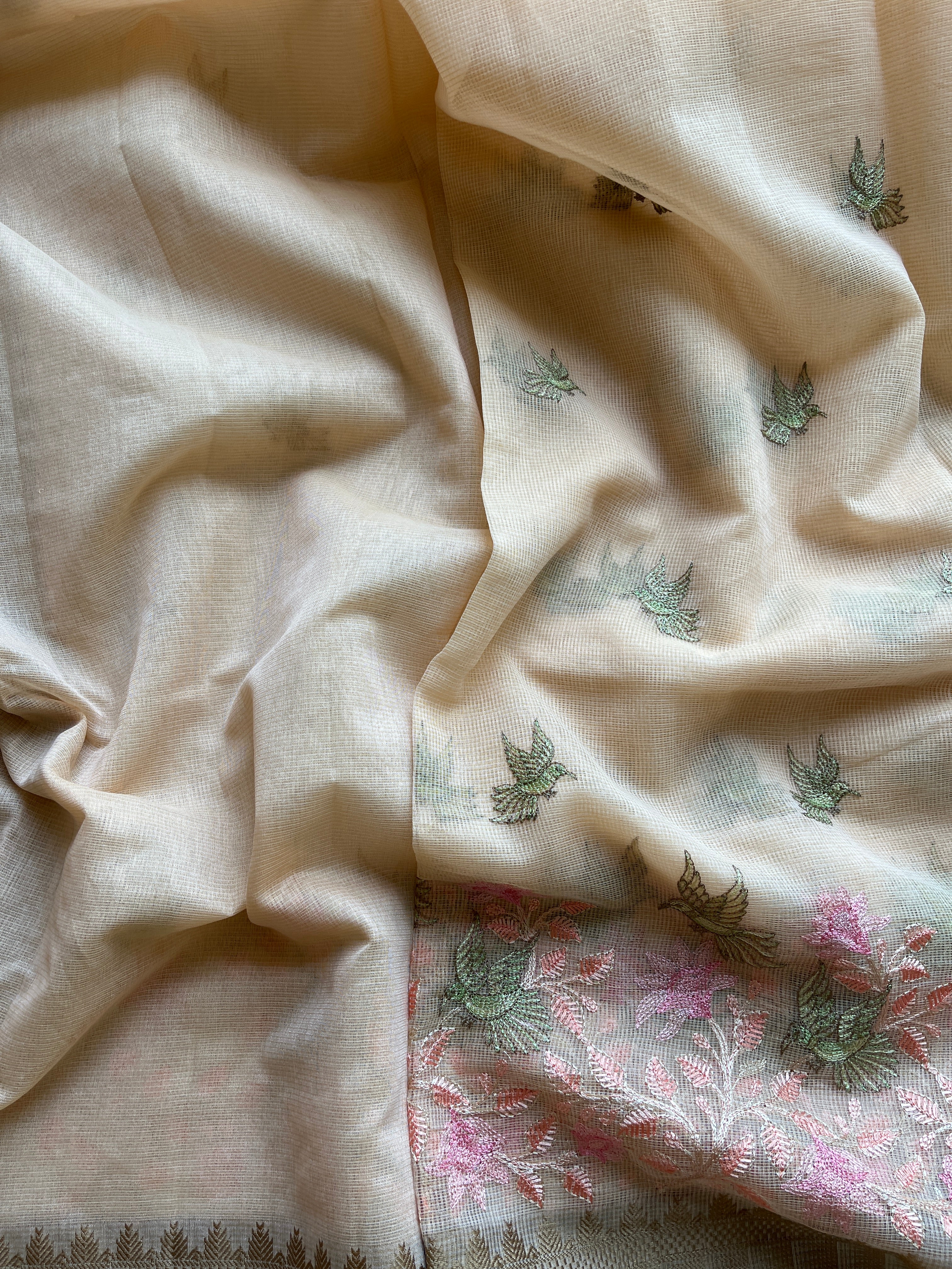 Peach linen blend embroidered saree