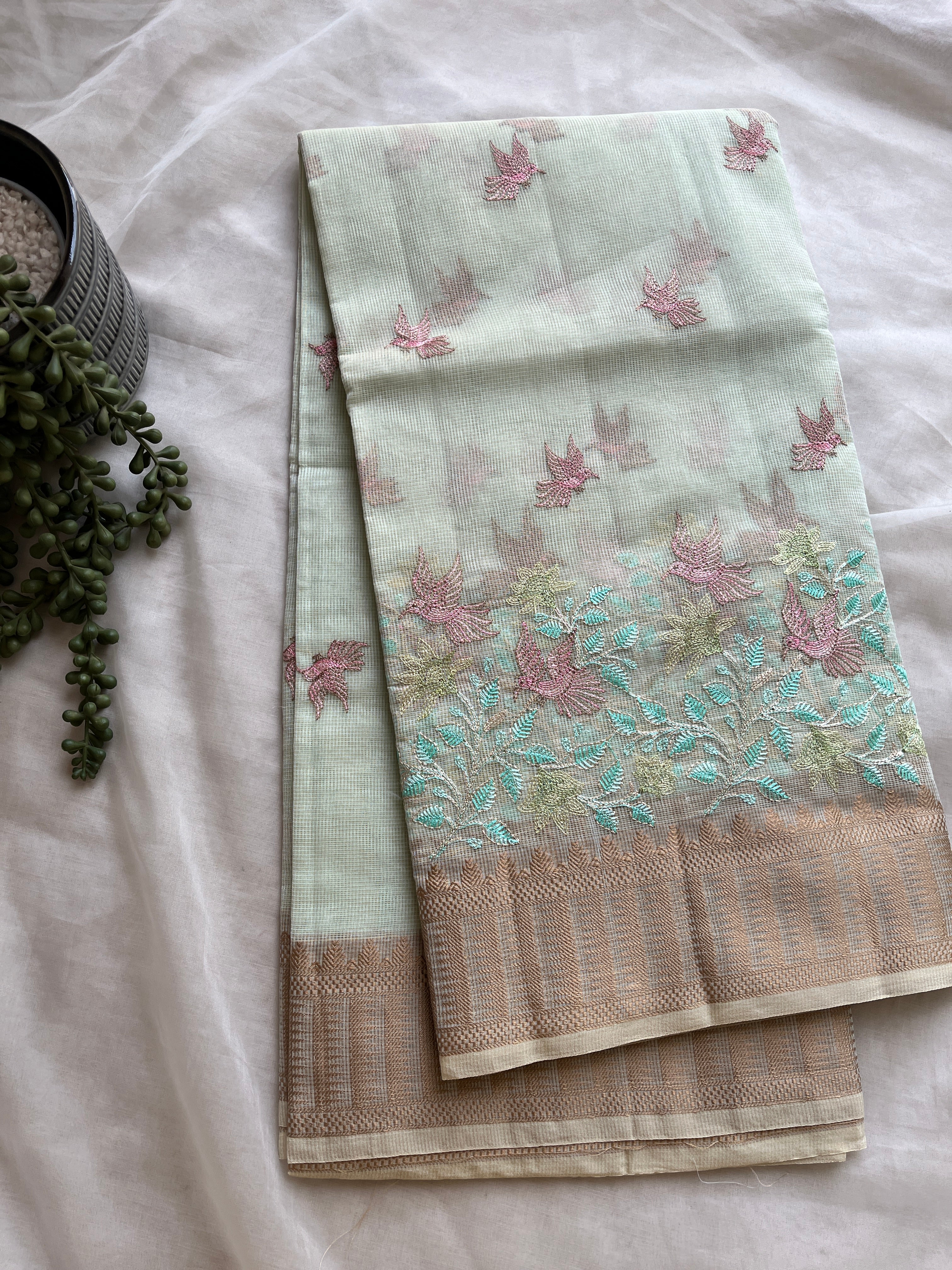 Powder blue  linen blend embroidered saree