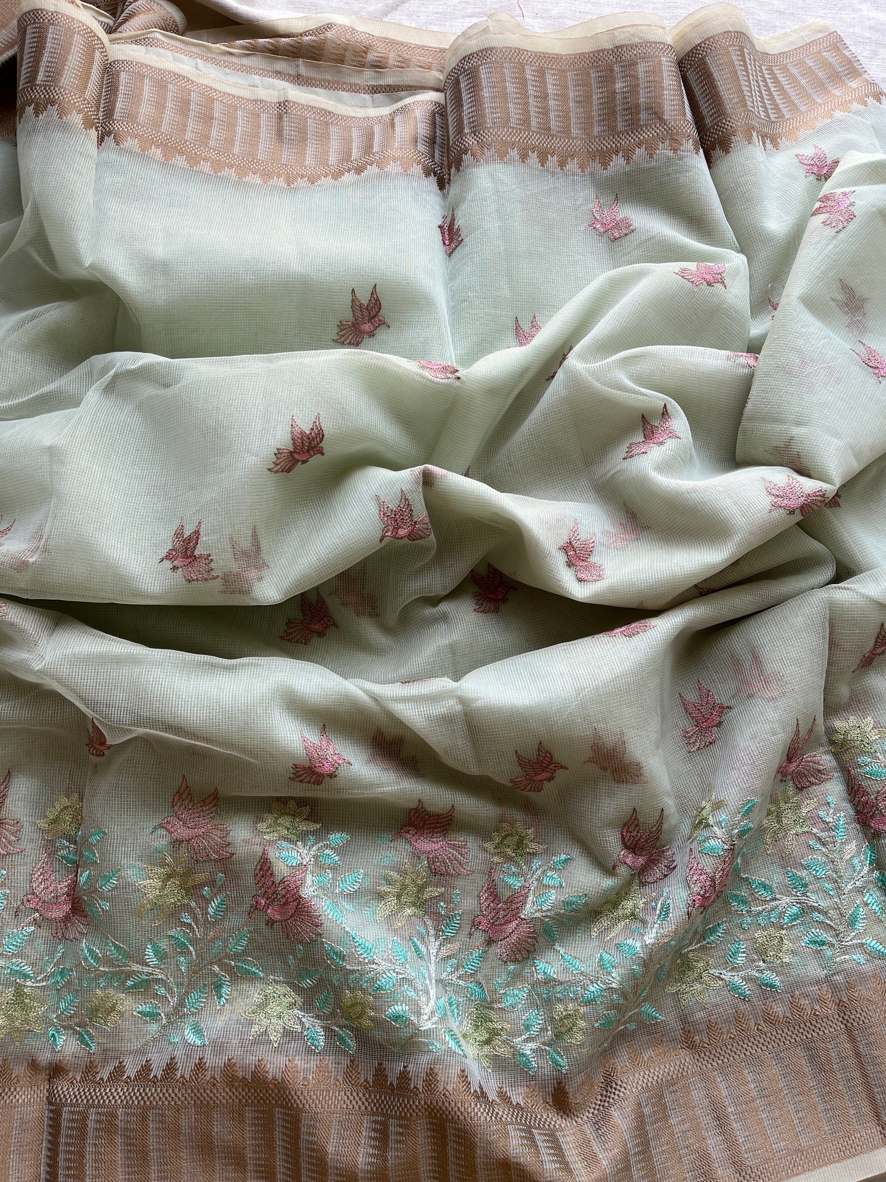 Powder blue  linen blend embroidered saree