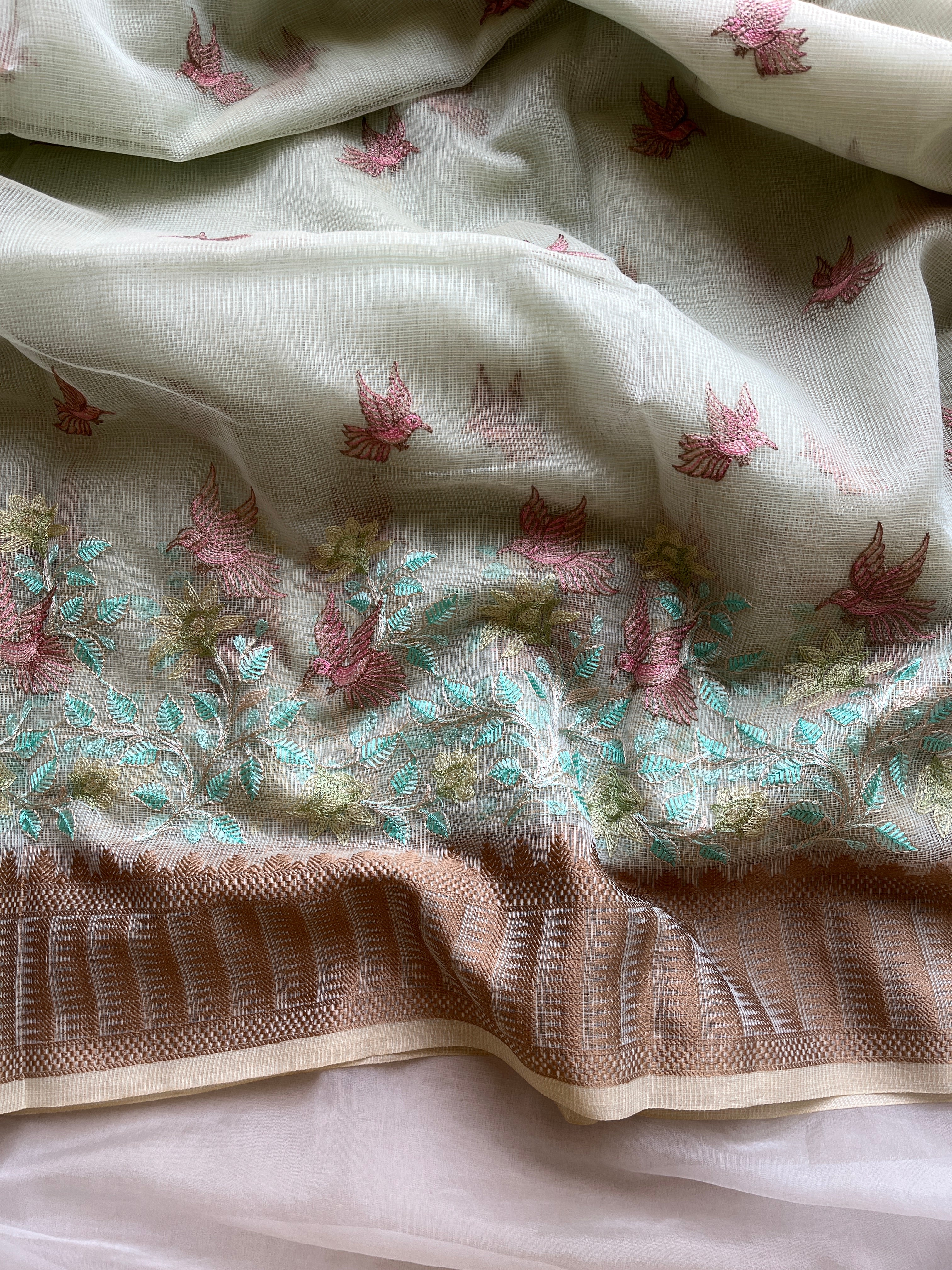 Powder blue  linen blend embroidered saree