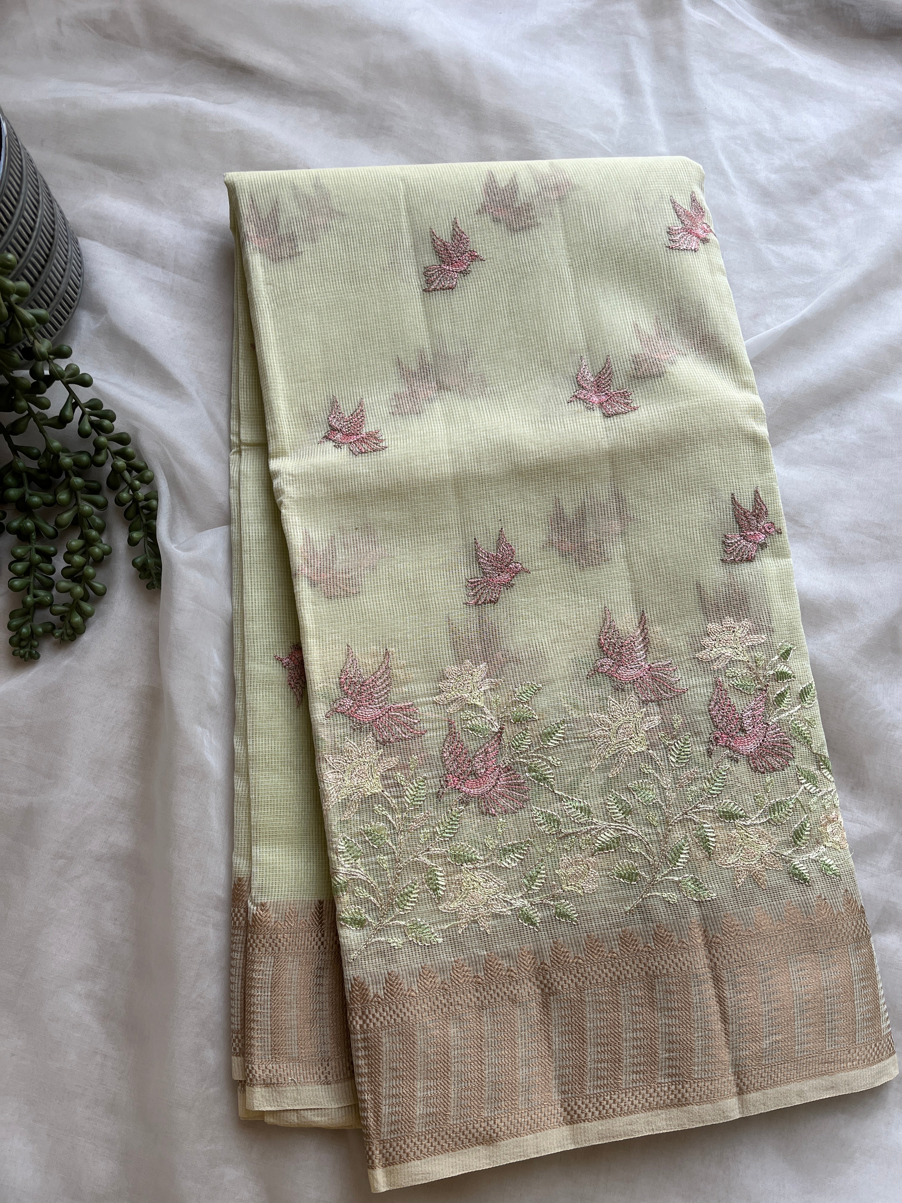 Pastel green  linen blend embroidered saree