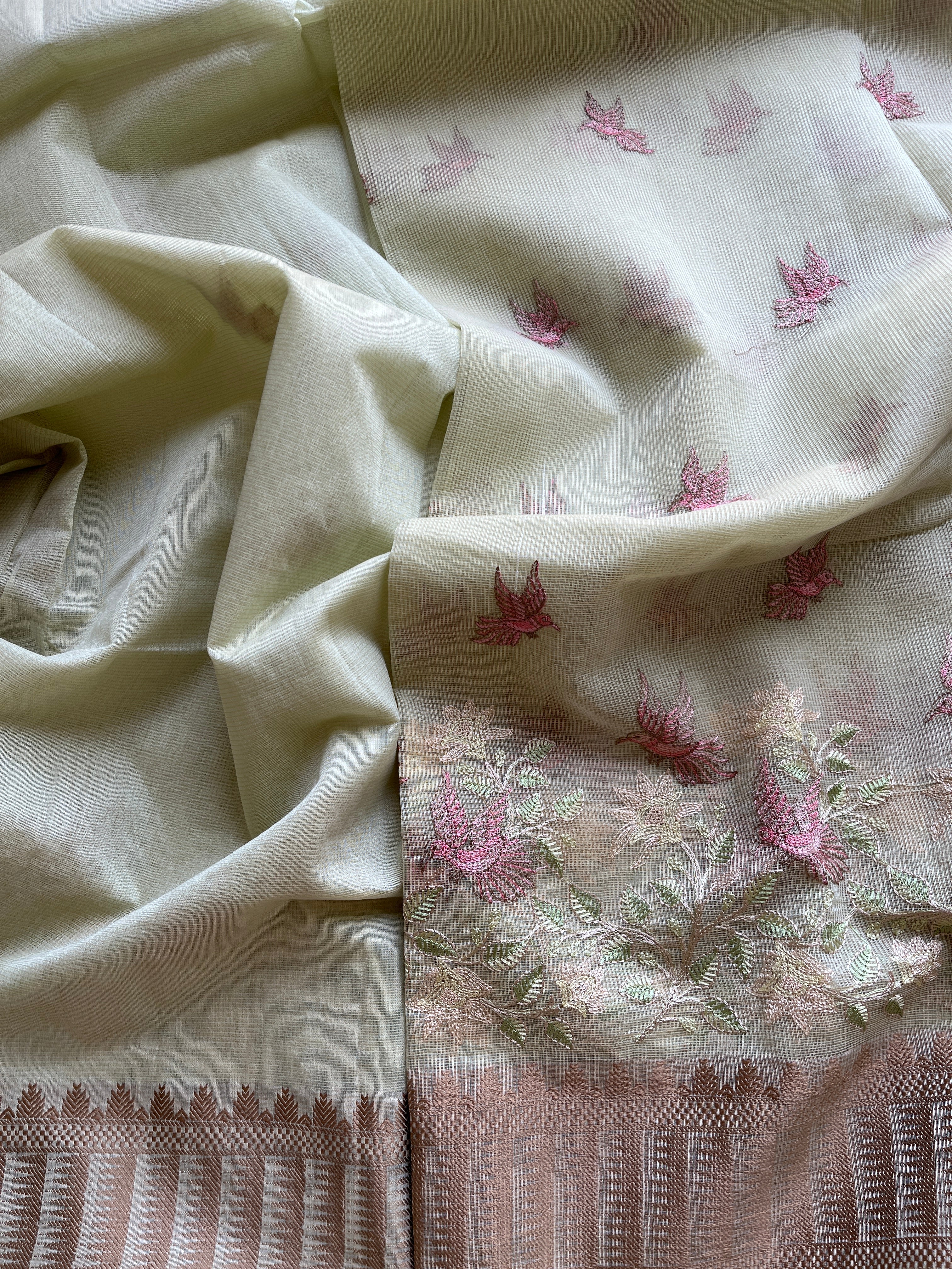 Pastel green  linen blend embroidered saree