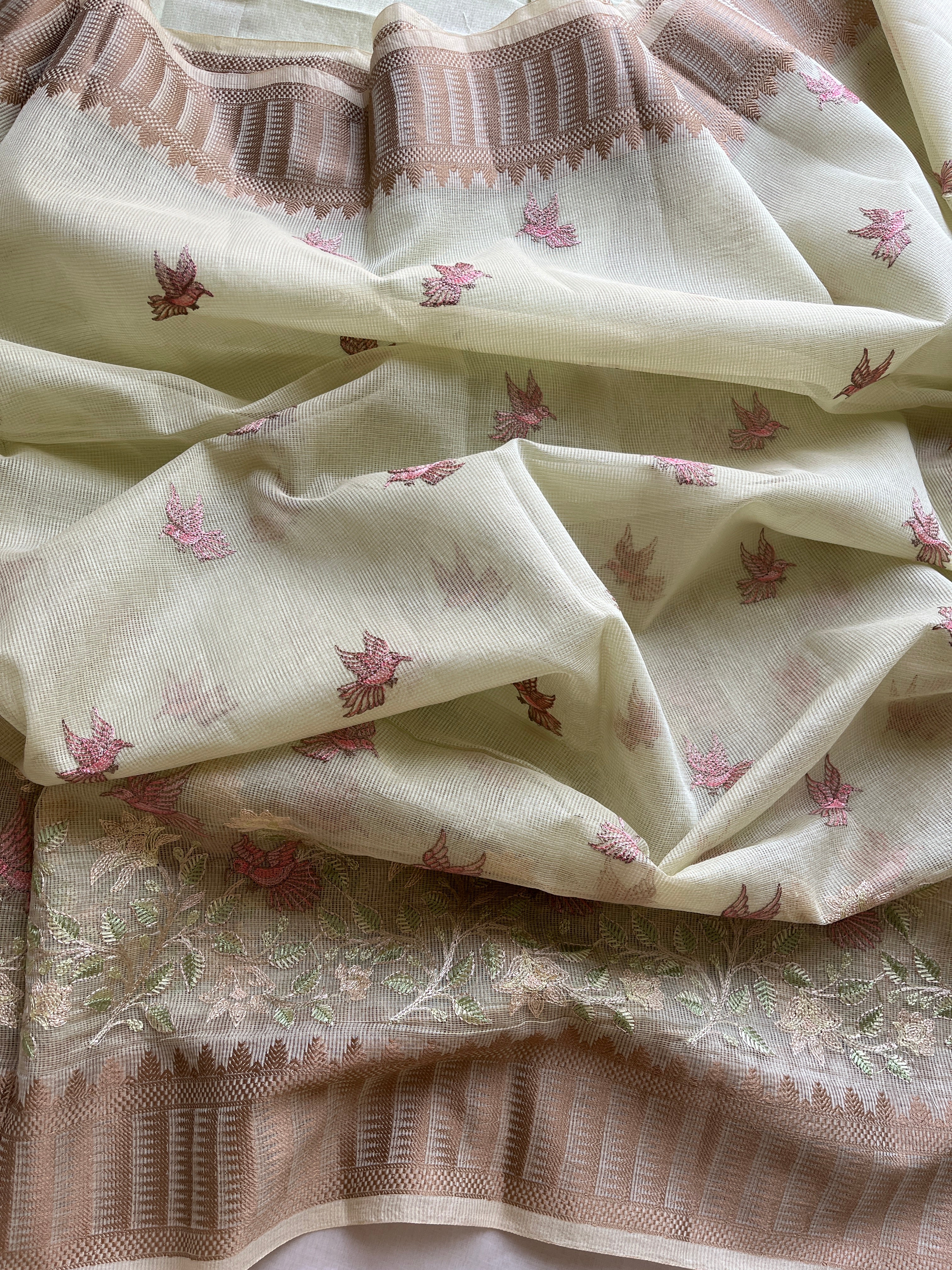 Pastel green  linen blend embroidered saree