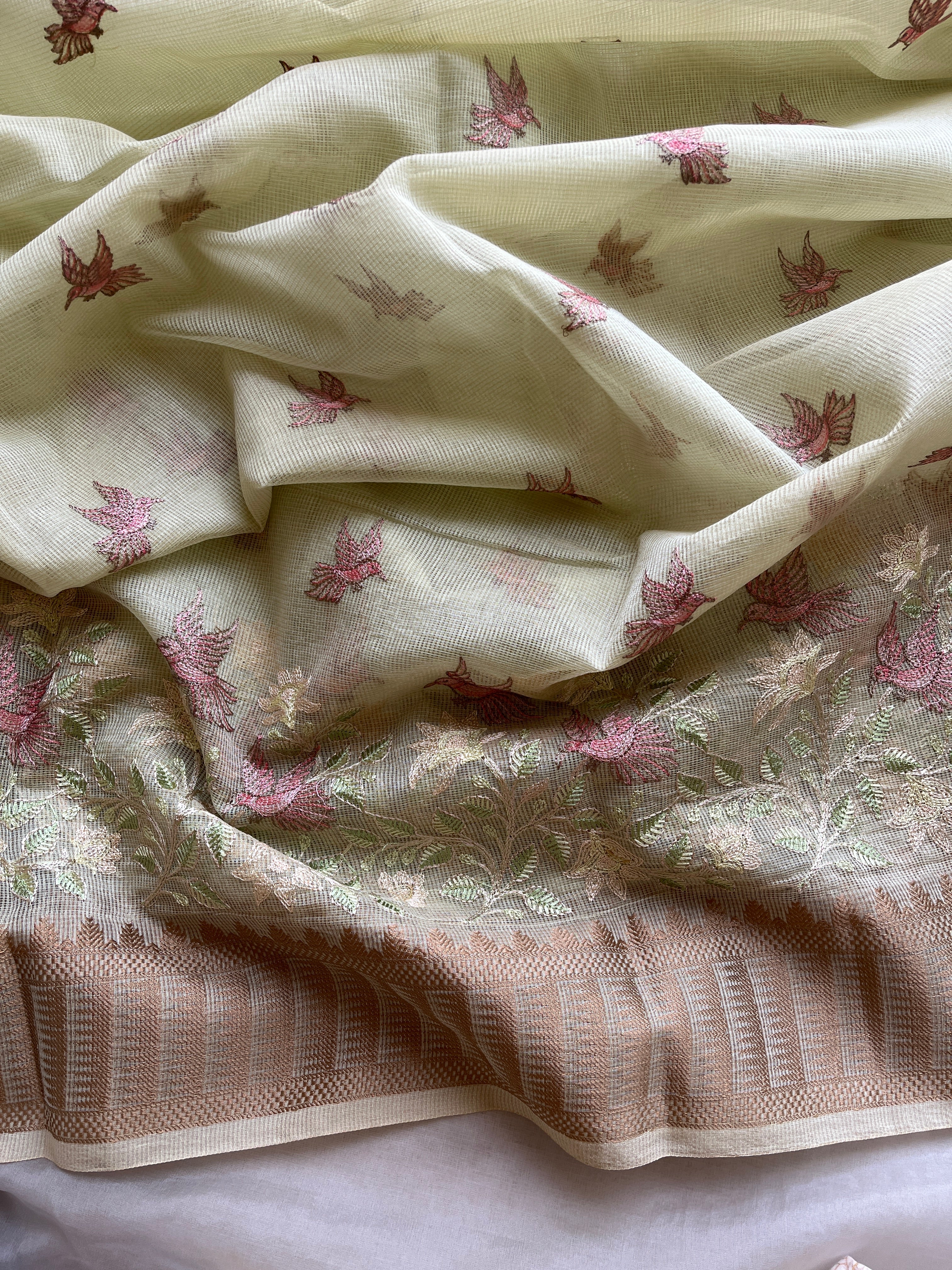 Pastel green  linen blend embroidered saree