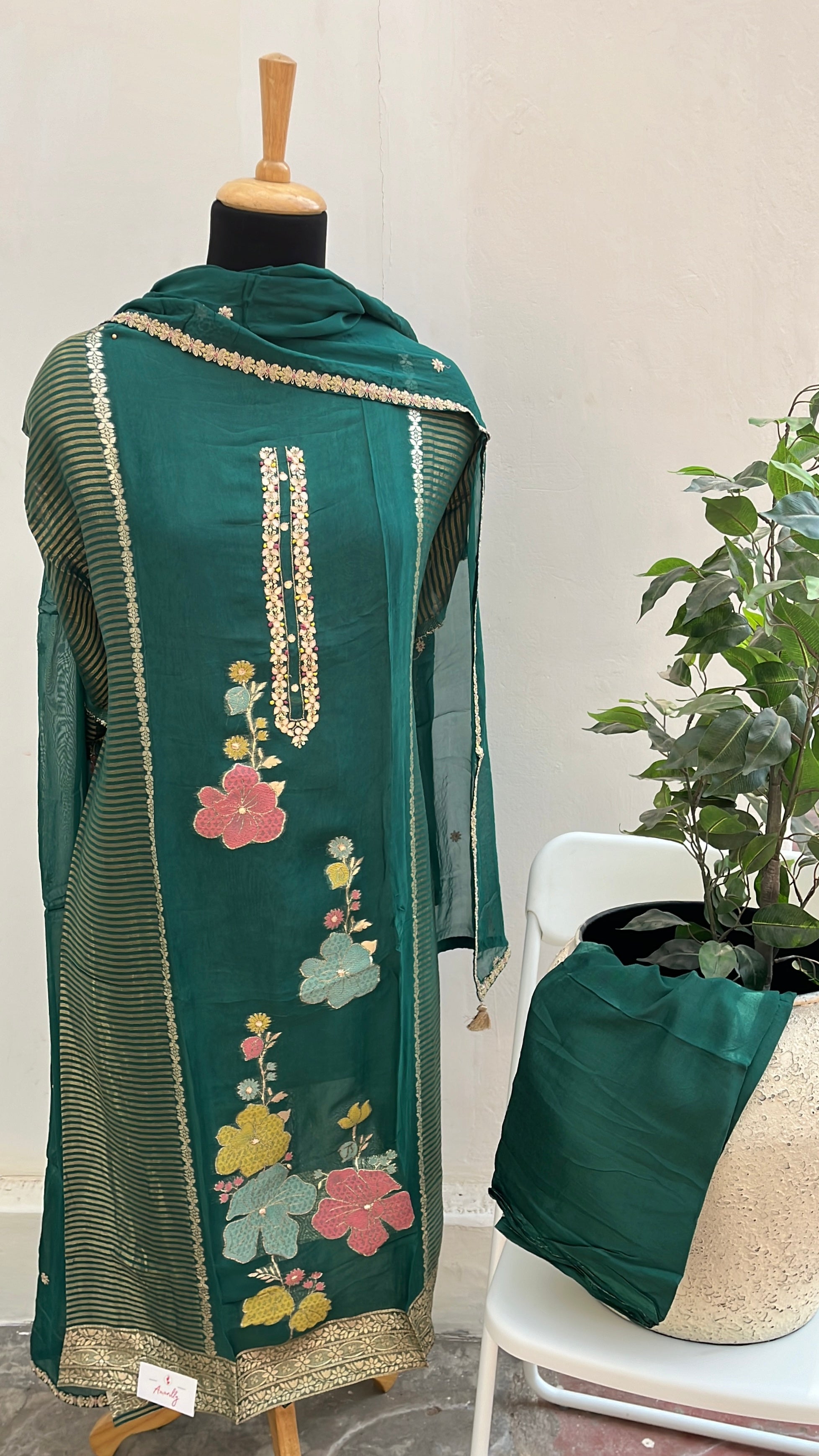 Green zari floral semi stitched suit set