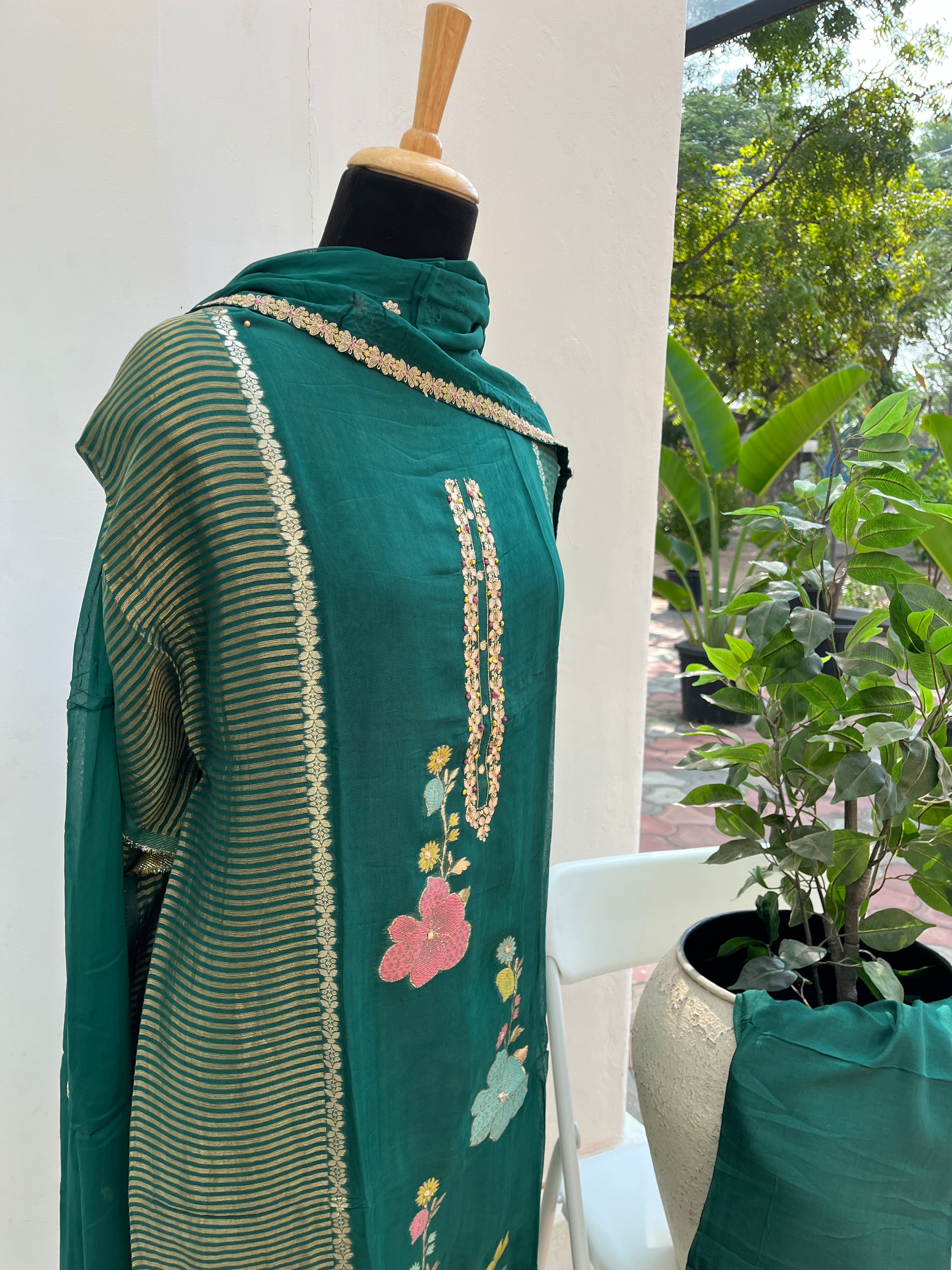 Green zari floral semi stitched suit set