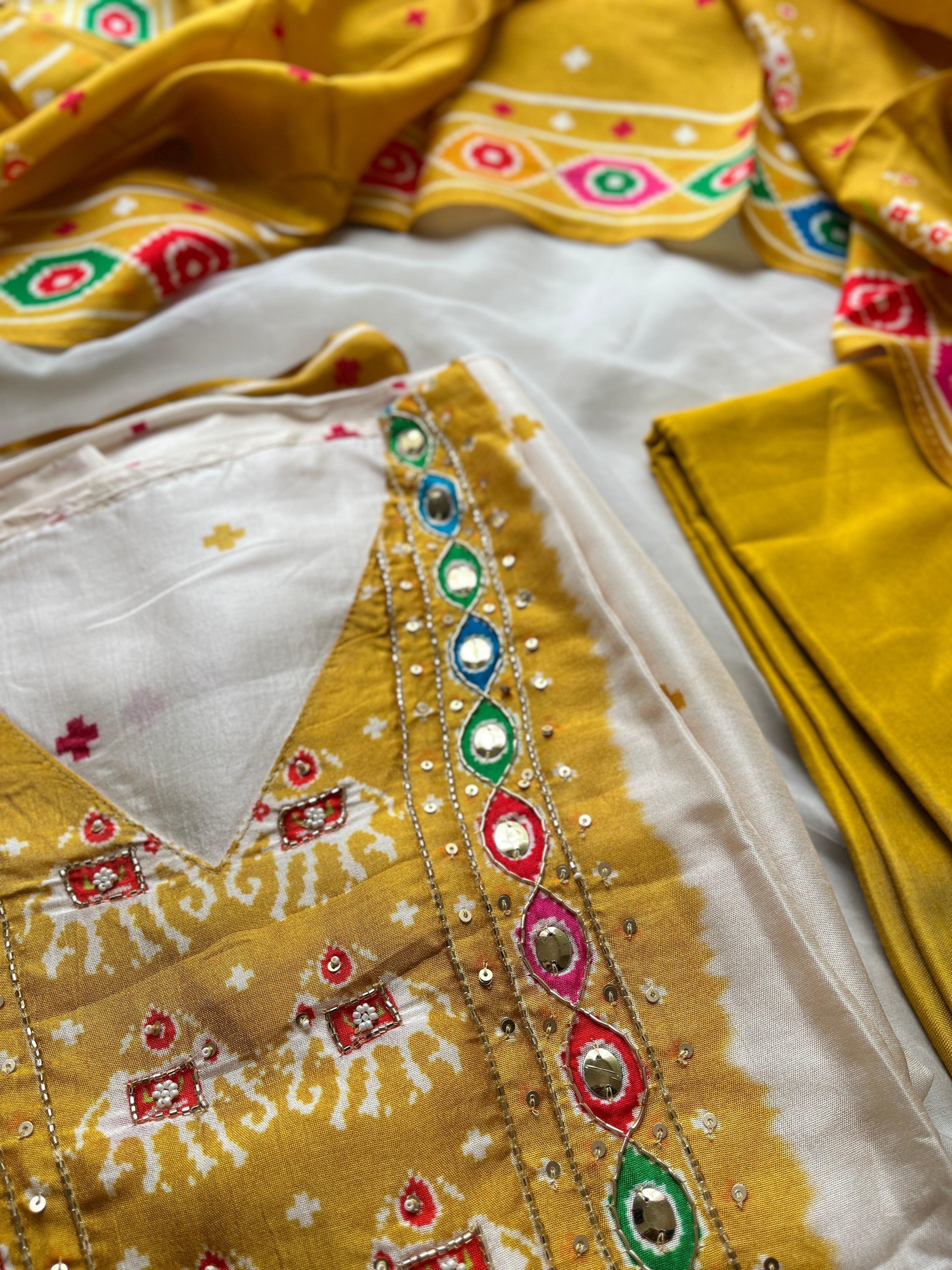 Yellow Patola semi stitched suit set