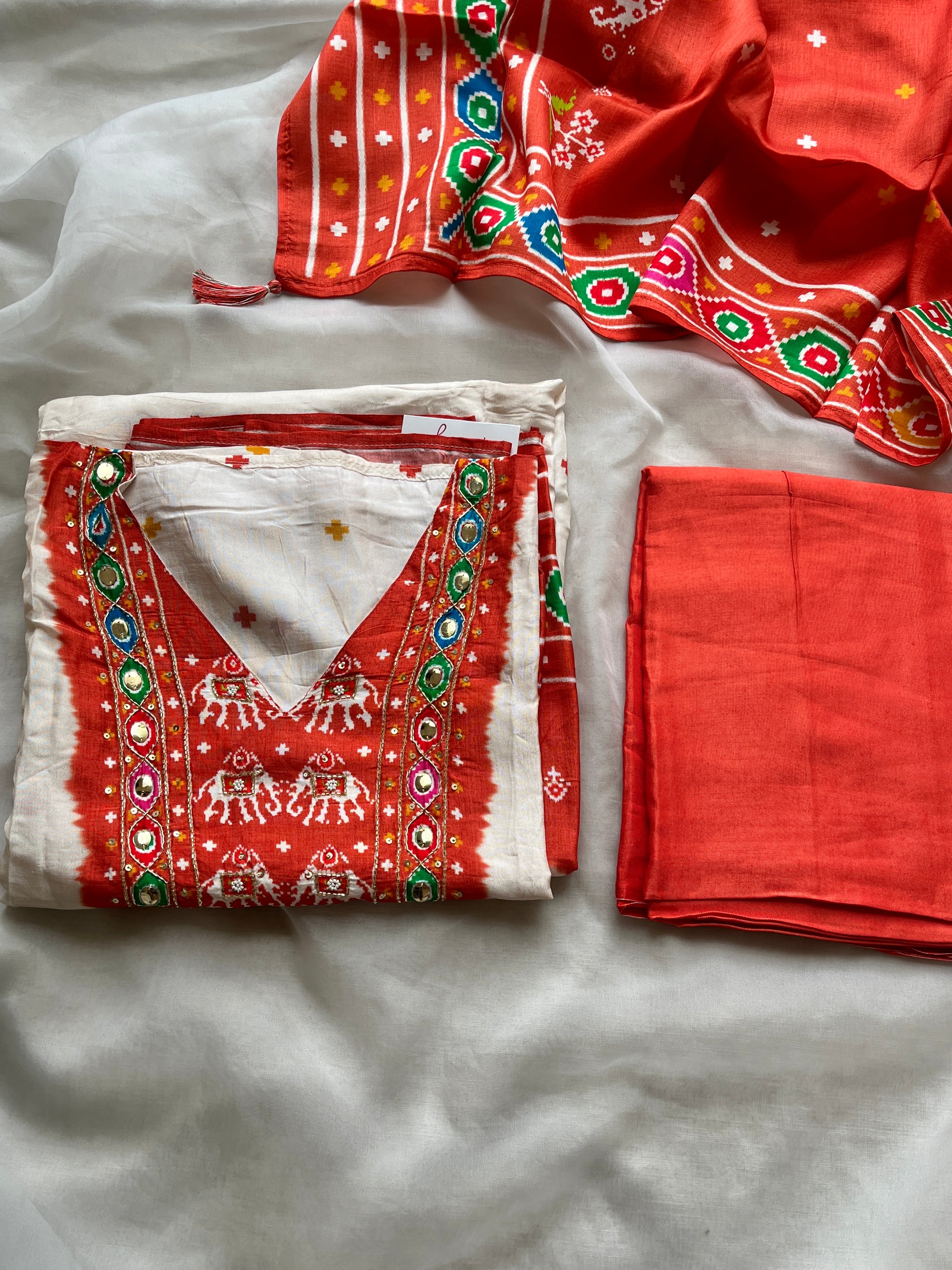 Orange Patola semi stitched suit set