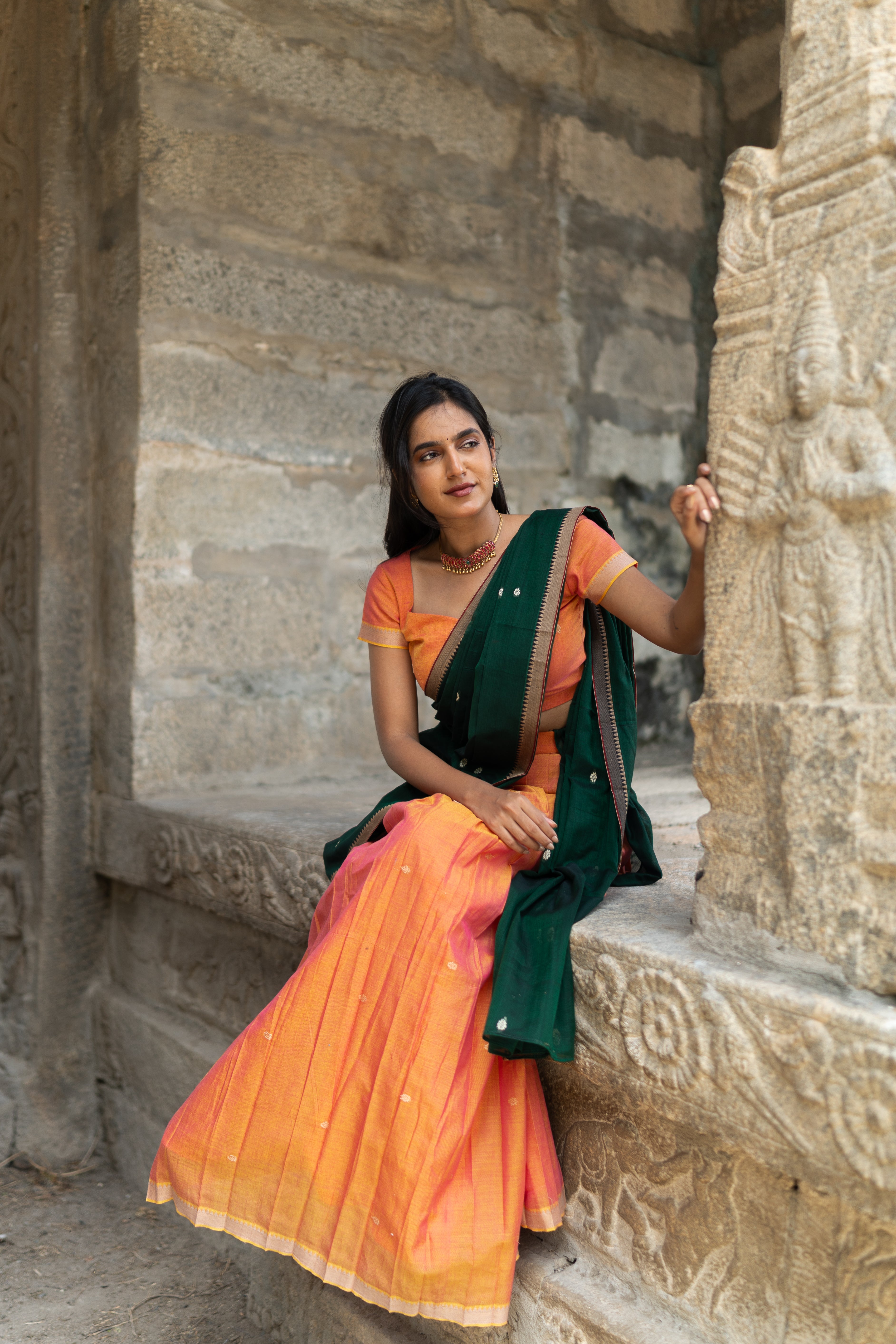 Orange with dark green half saree
