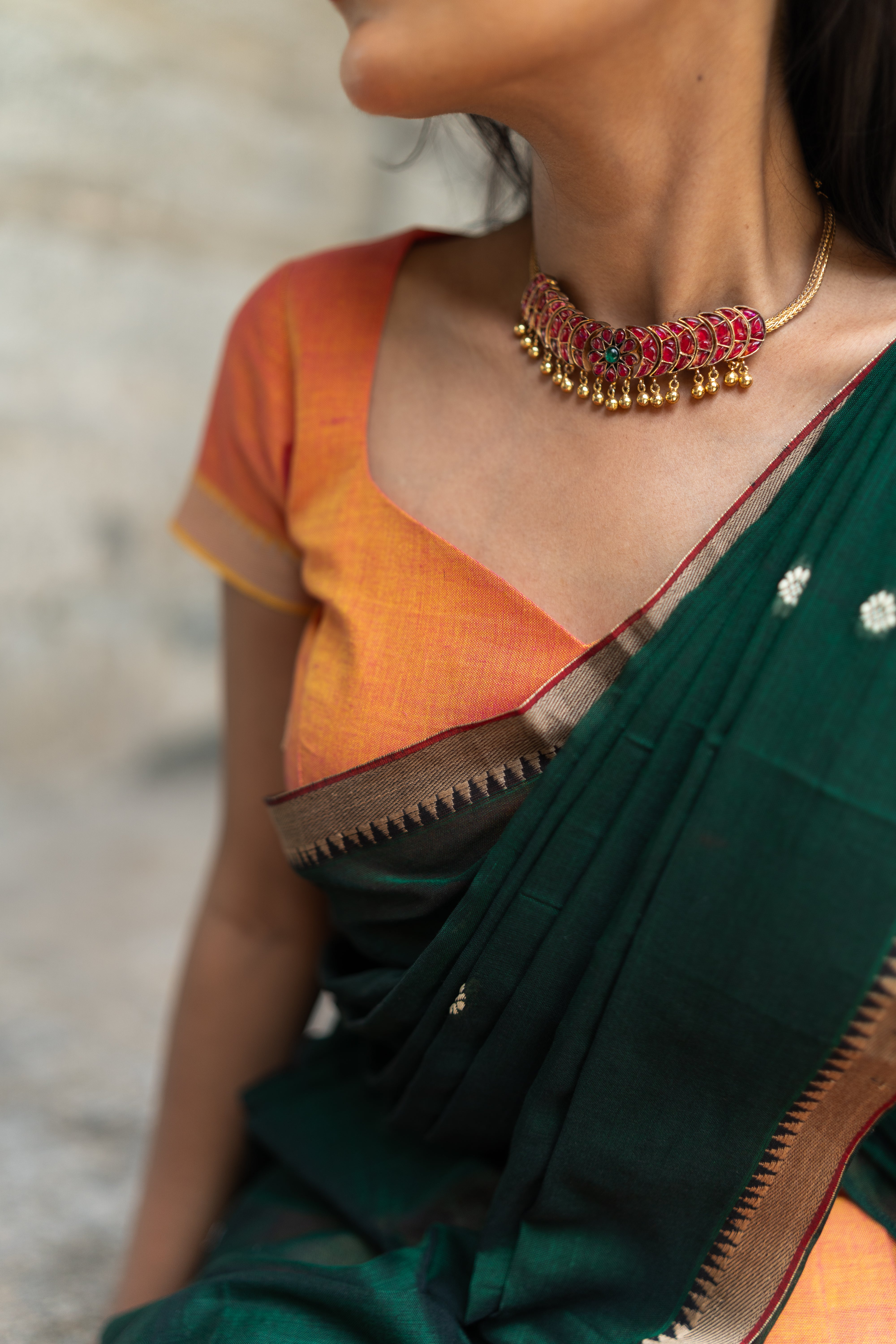 Orange with dark green half saree