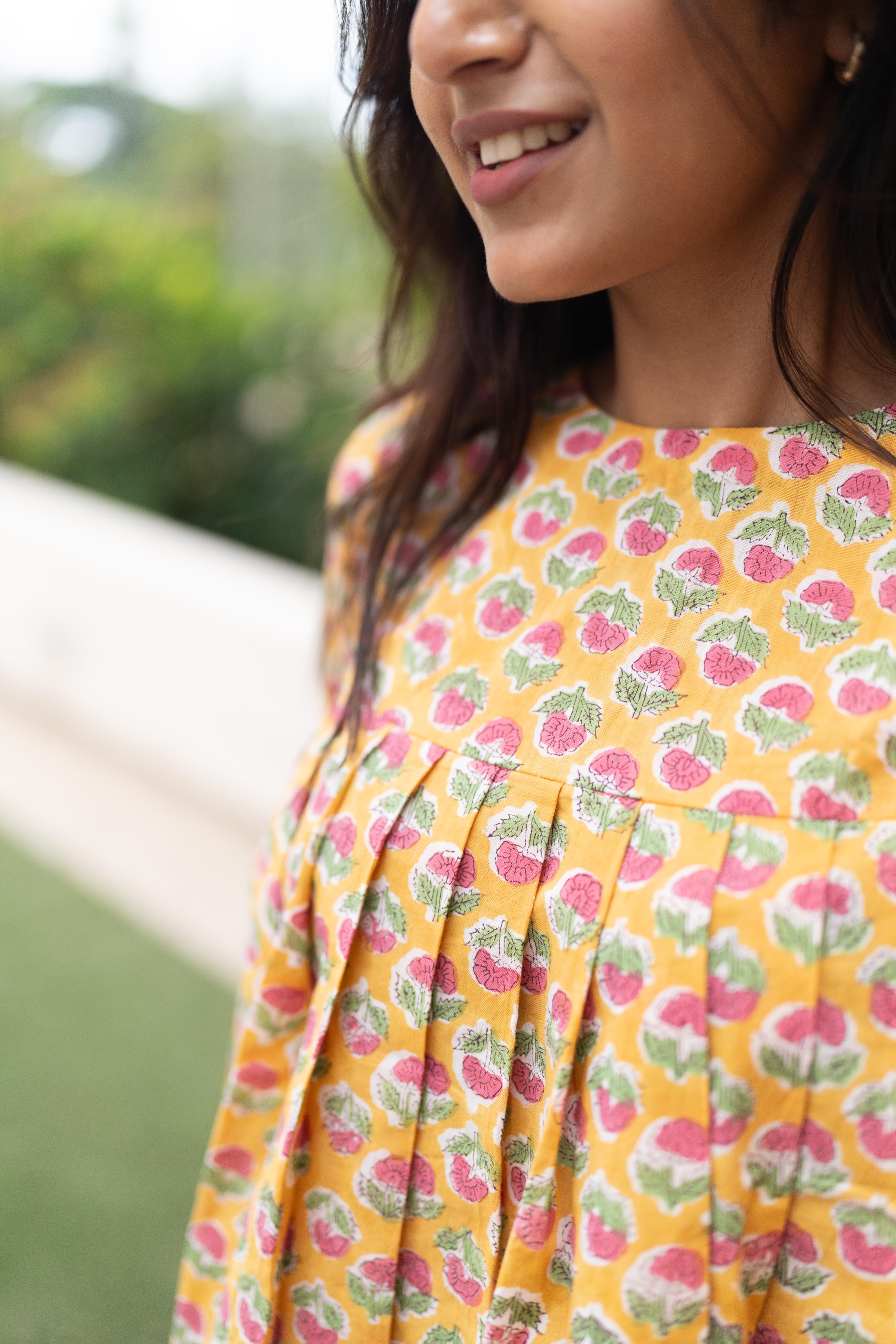 Sol yellow short top