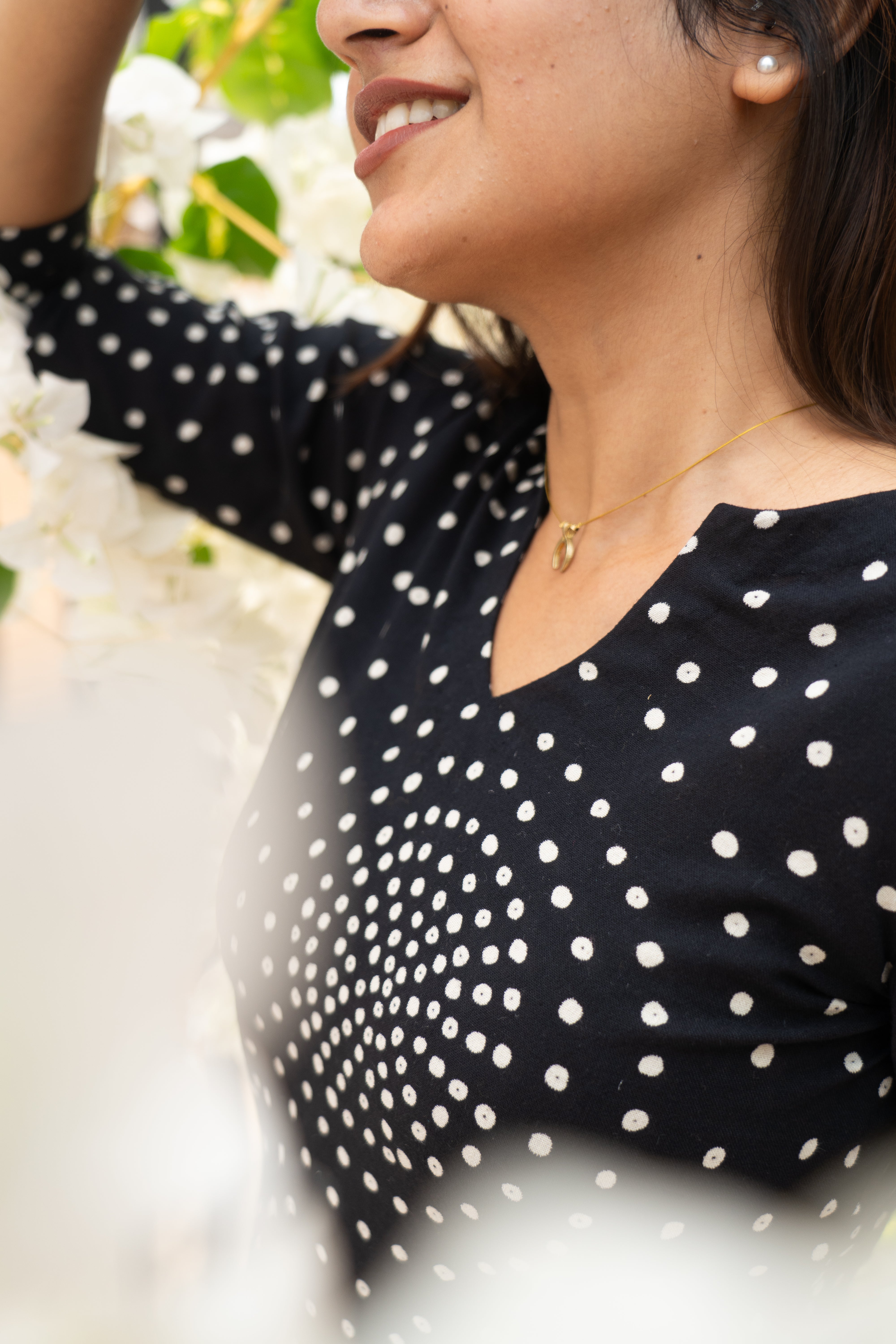 Black polka short top with white pattern trousers