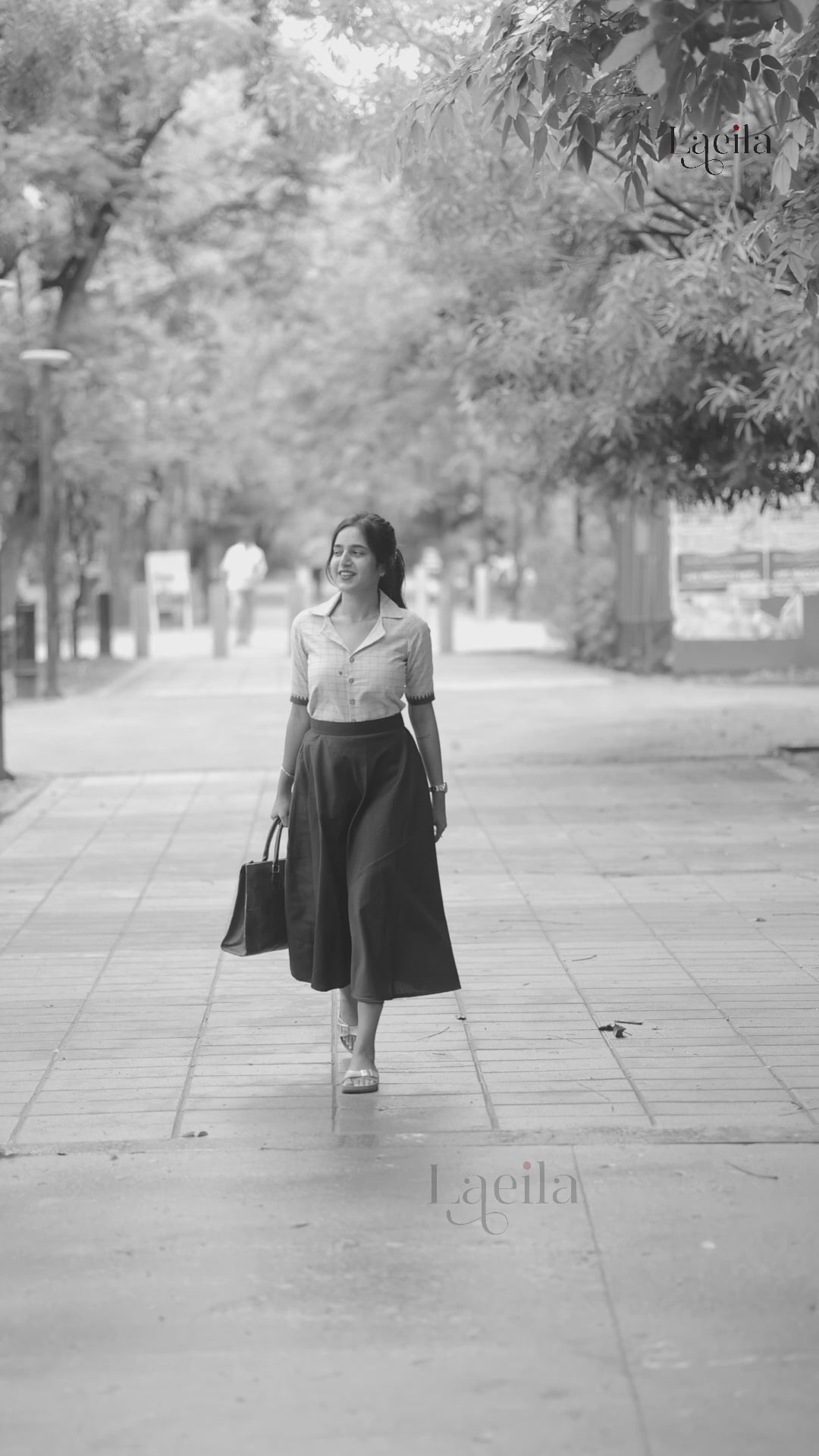 Chic Beige Checked Top with black skirt